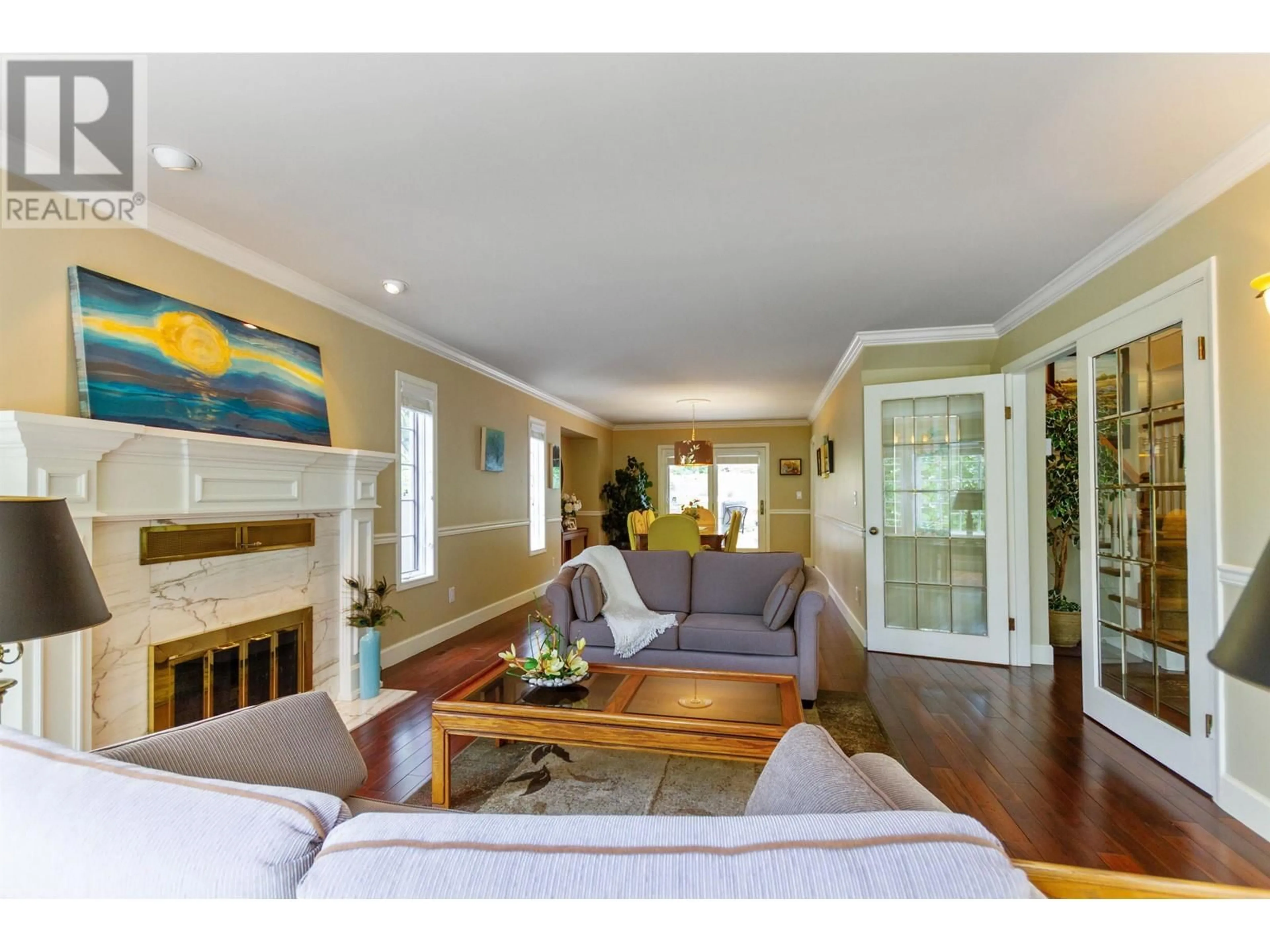 Living room with furniture, wood/laminate floor for 408 RIVERVIEW CRESCENT, Coquitlam British Columbia V3C4X8
