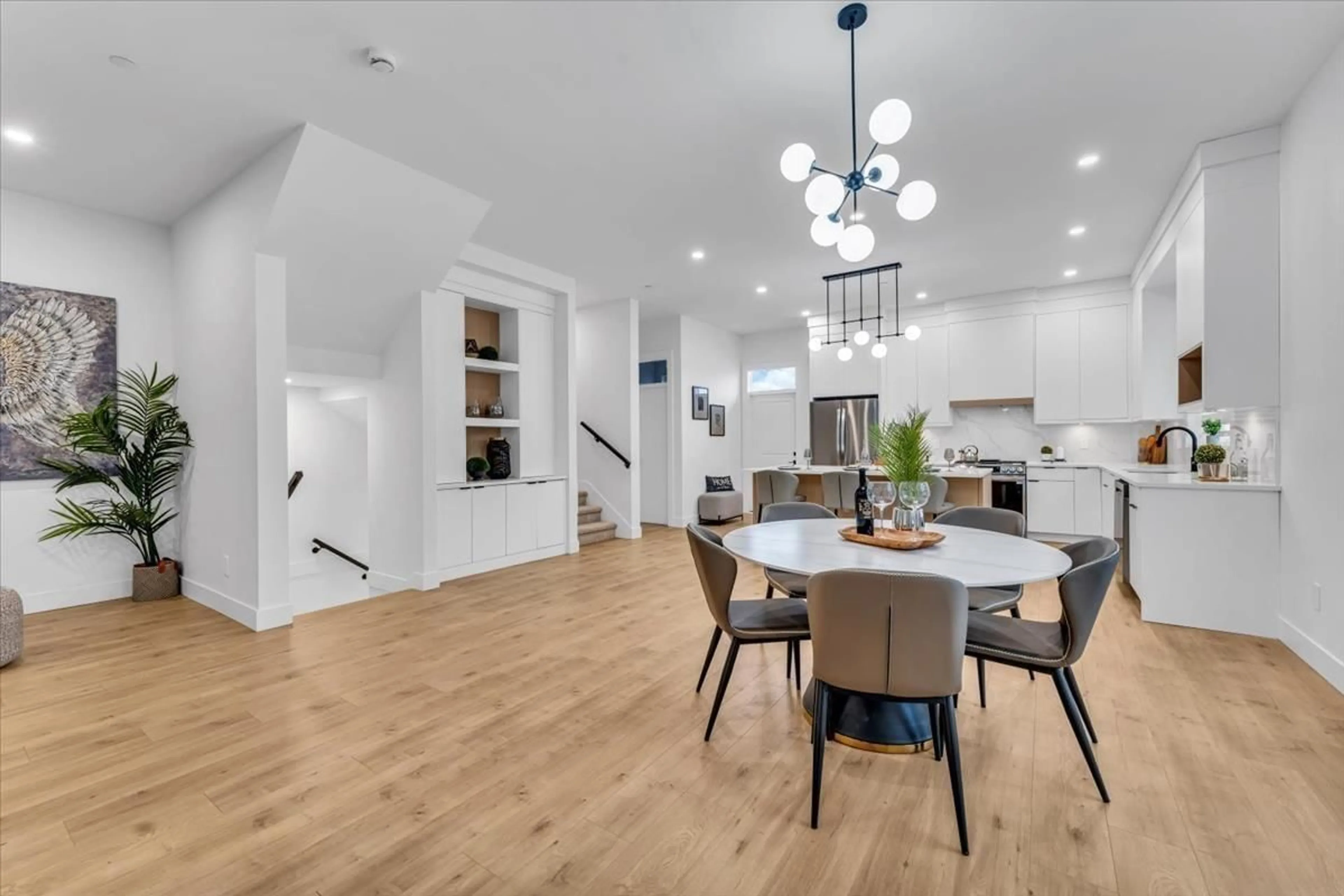 Open concept kitchen, wood/laminate floor for 20489 74B, Langley British Columbia V2Y1V5