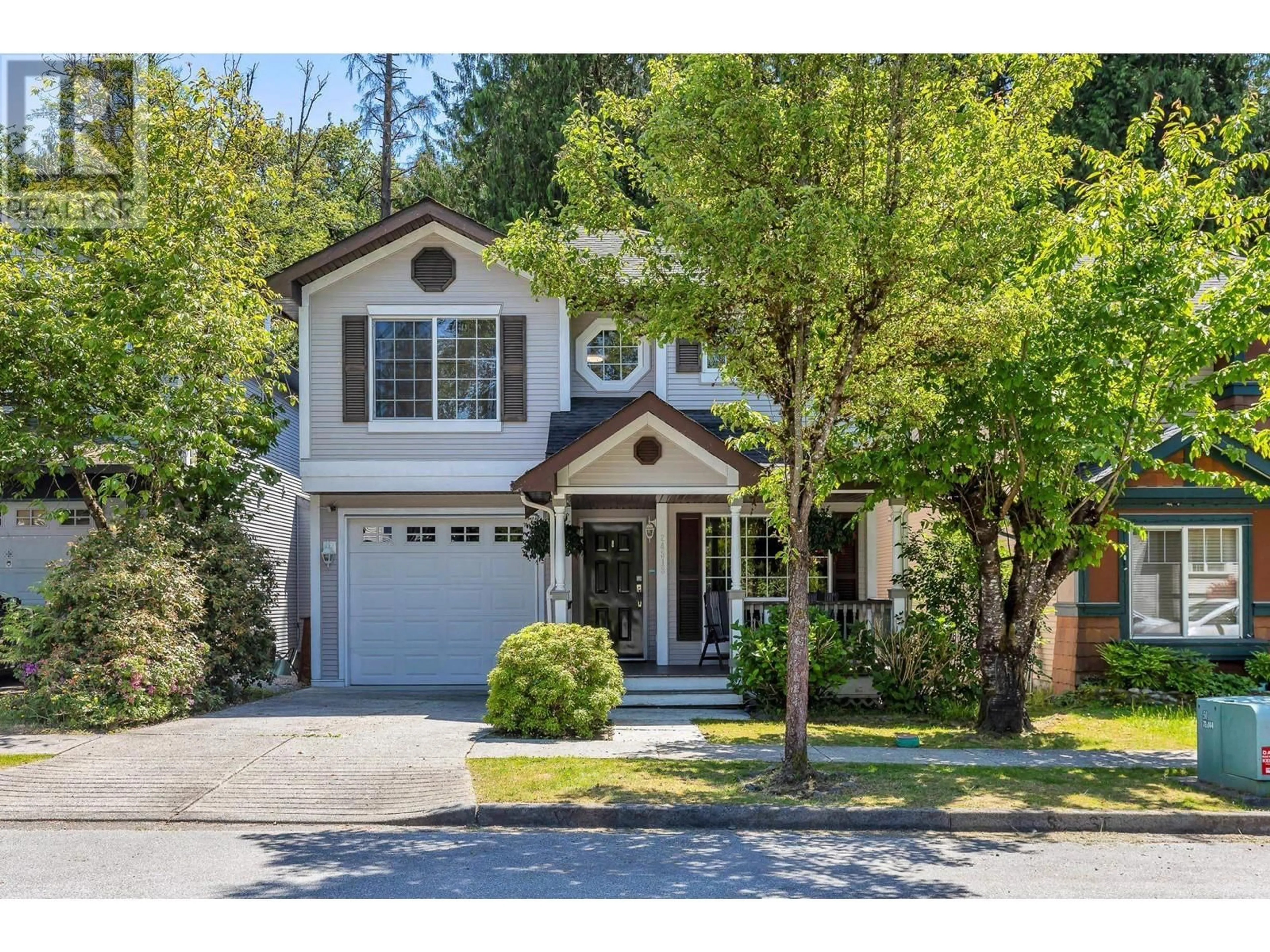 Home with vinyl exterior material, street for 24318 100B AVENUE, Maple Ridge British Columbia V2W1X3