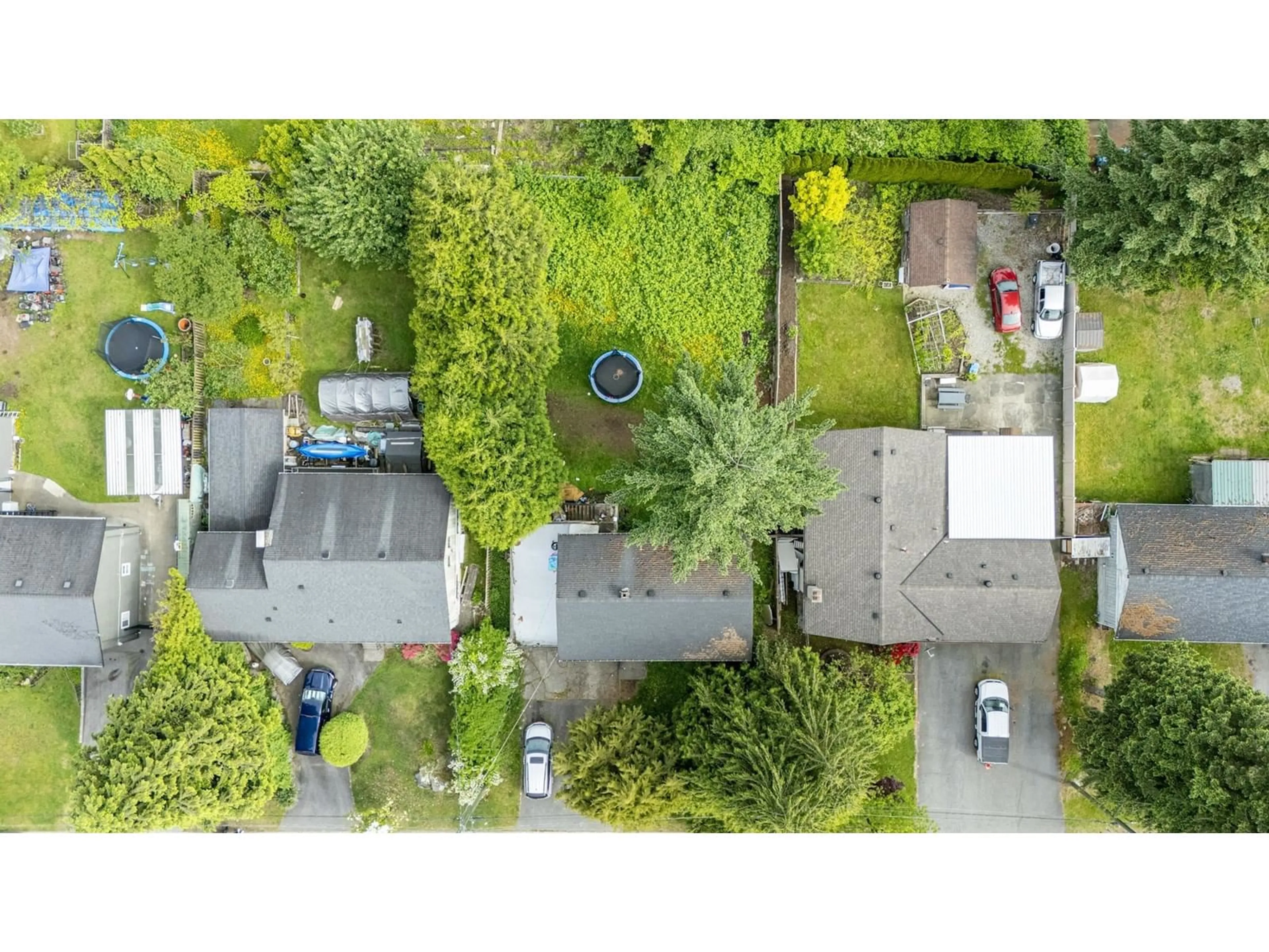 A pic from outside/outdoor area/front of a property/back of a property/a pic from drone, street for 14735 107A, Surrey British Columbia V3R1V2