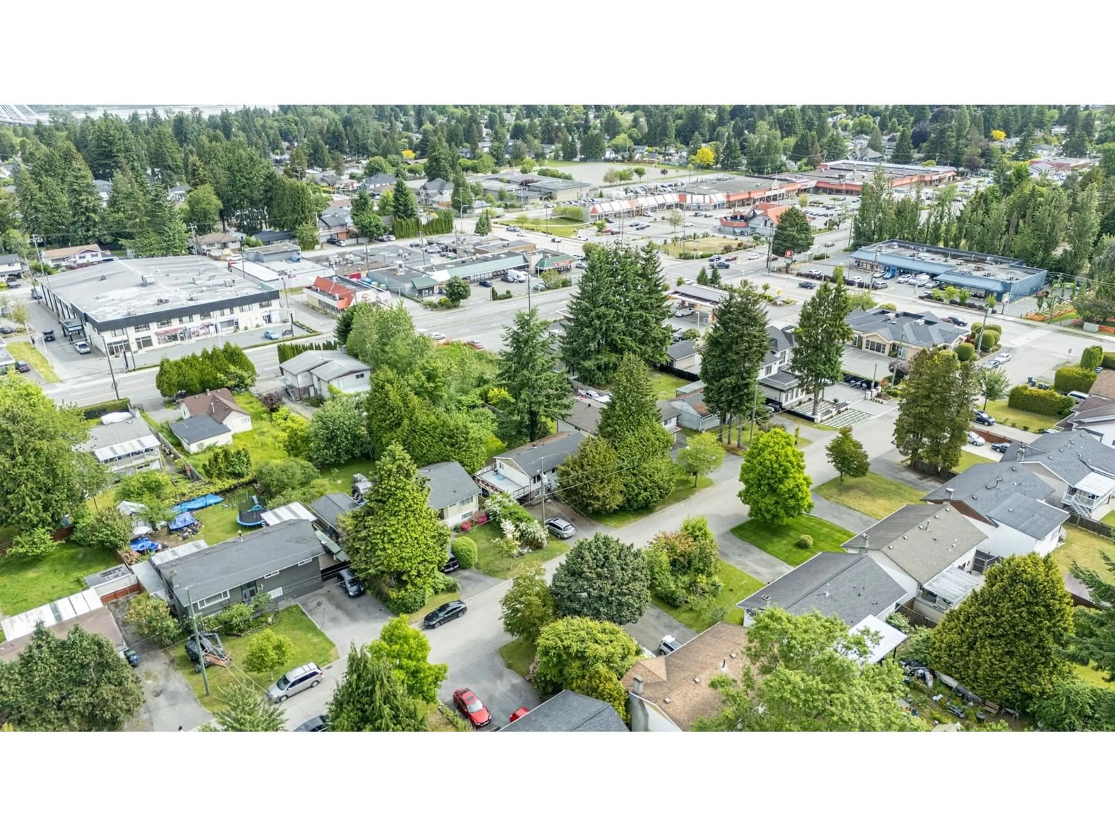 A pic from outside/outdoor area/front of a property/back of a property/a pic from drone, street for 14735 107A, Surrey British Columbia V3R1V2