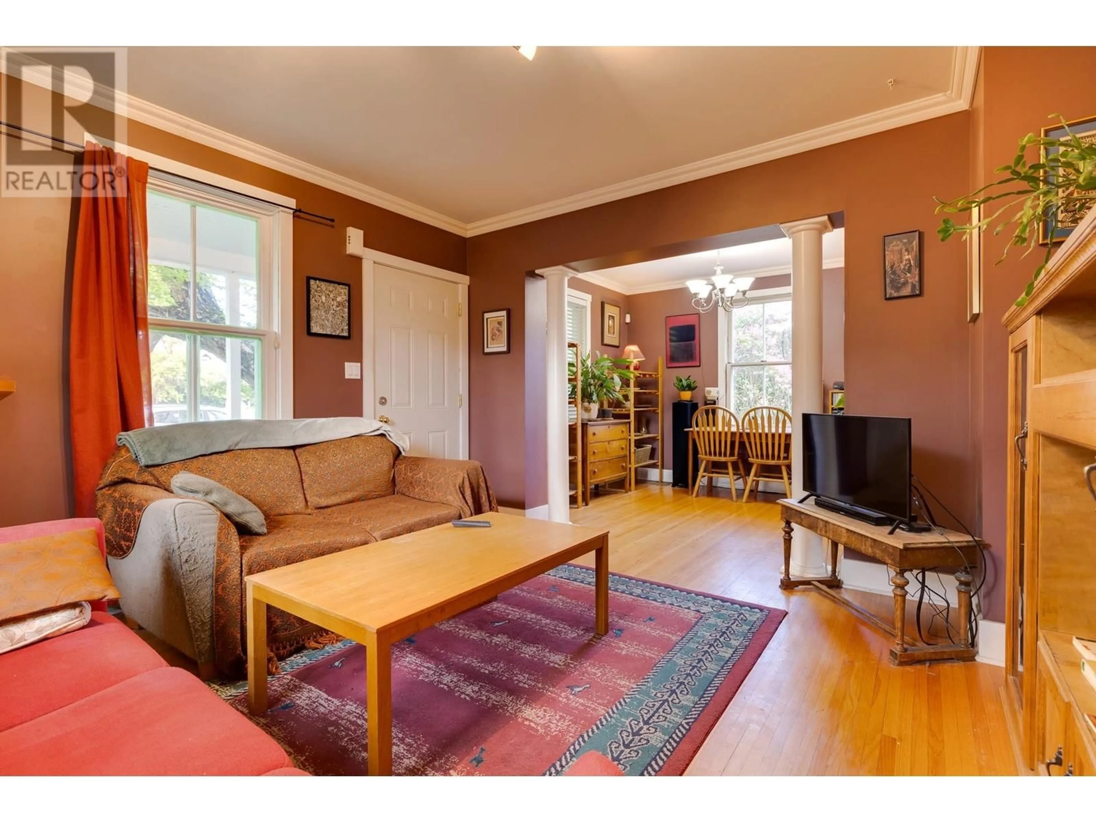 Living room with furniture, wood/laminate floor for 1684 5TH AVENUE, Prince George British Columbia V2L3M1