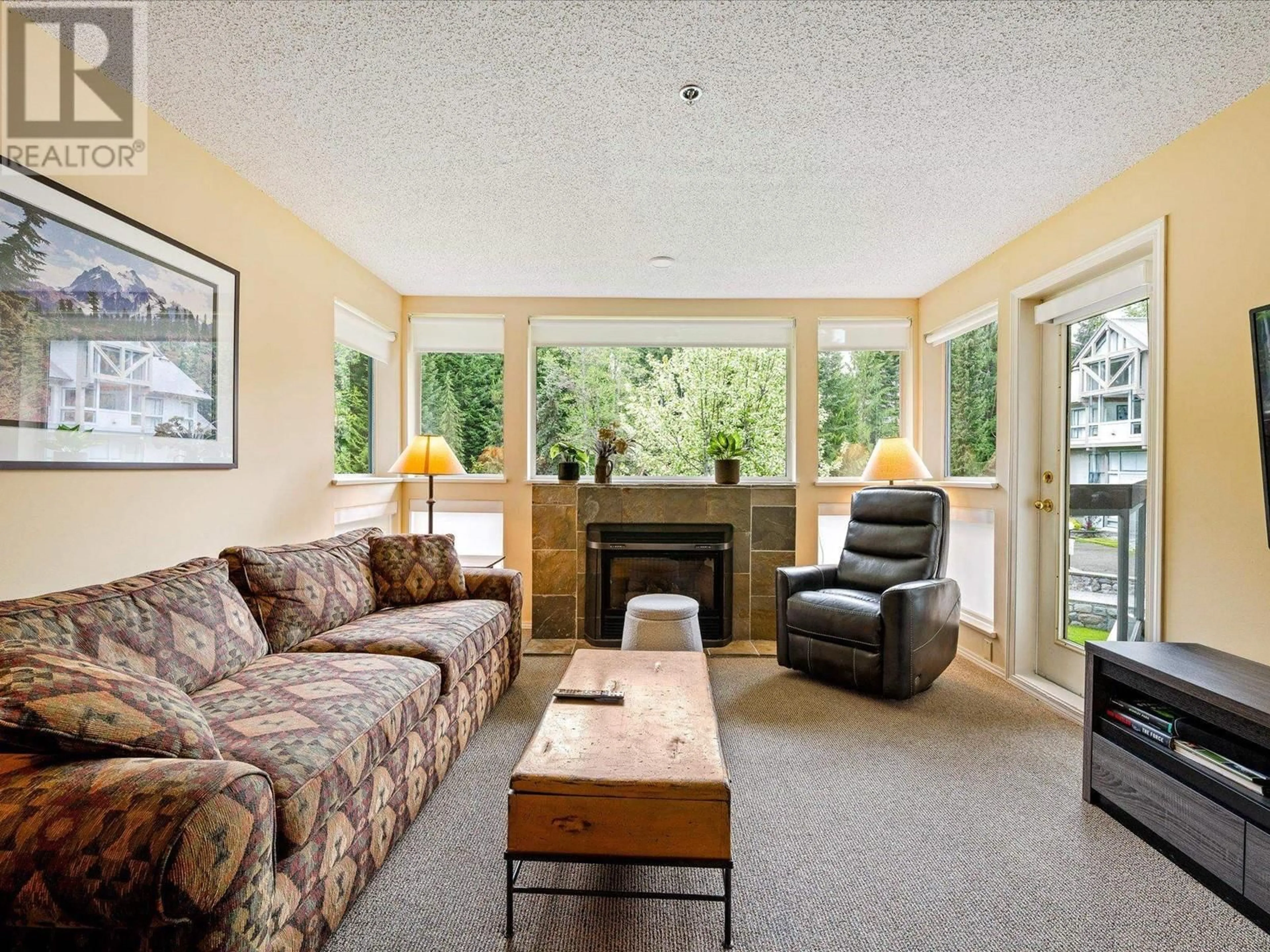 Living room with furniture, unknown for 303/304 - 4905 SPEARHEAD PLACE, Whistler British Columbia V8E1E8