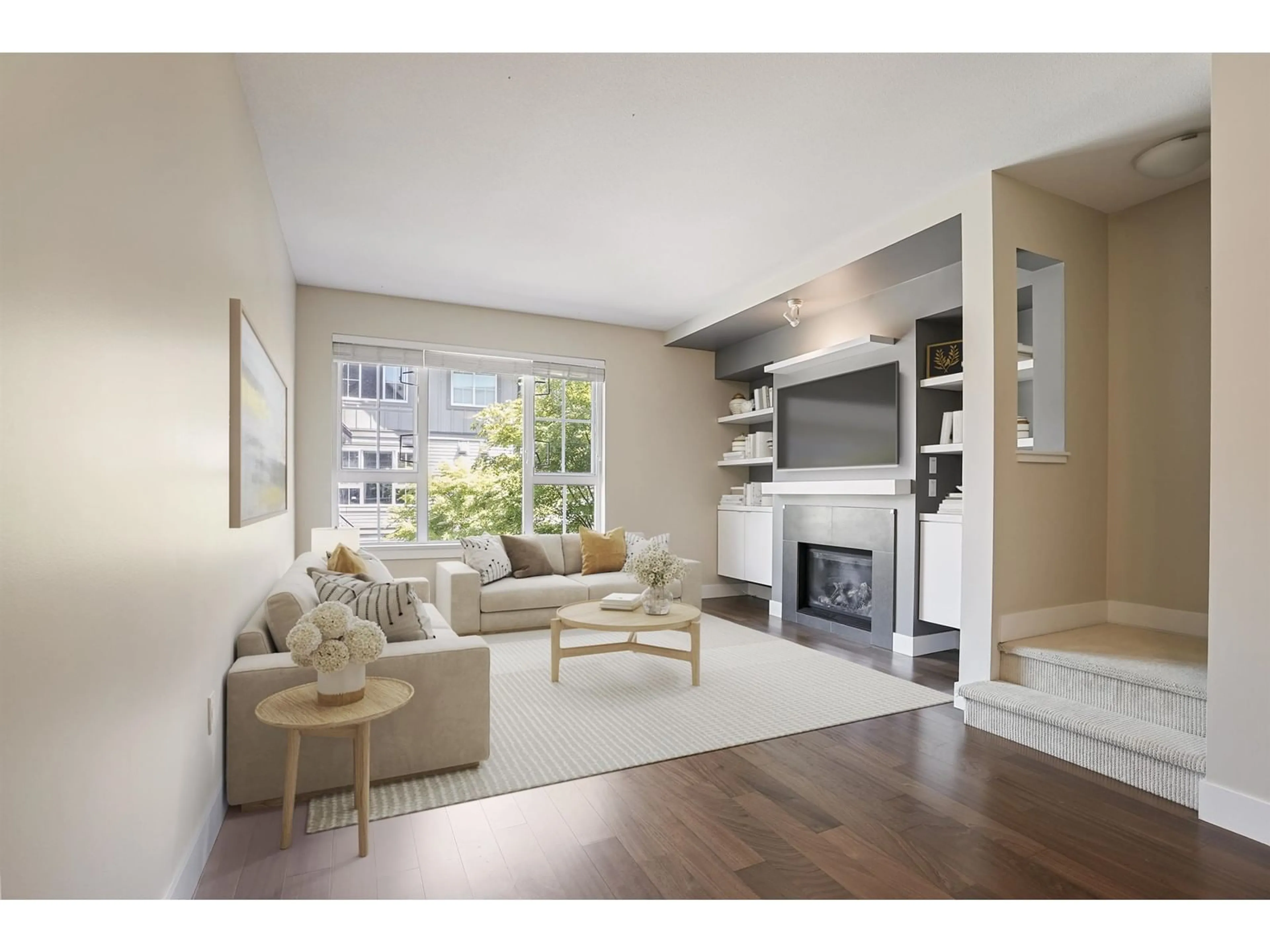 Living room with furniture, wood/laminate floor for 204 - 2501 161A, Surrey British Columbia V3S7Y6
