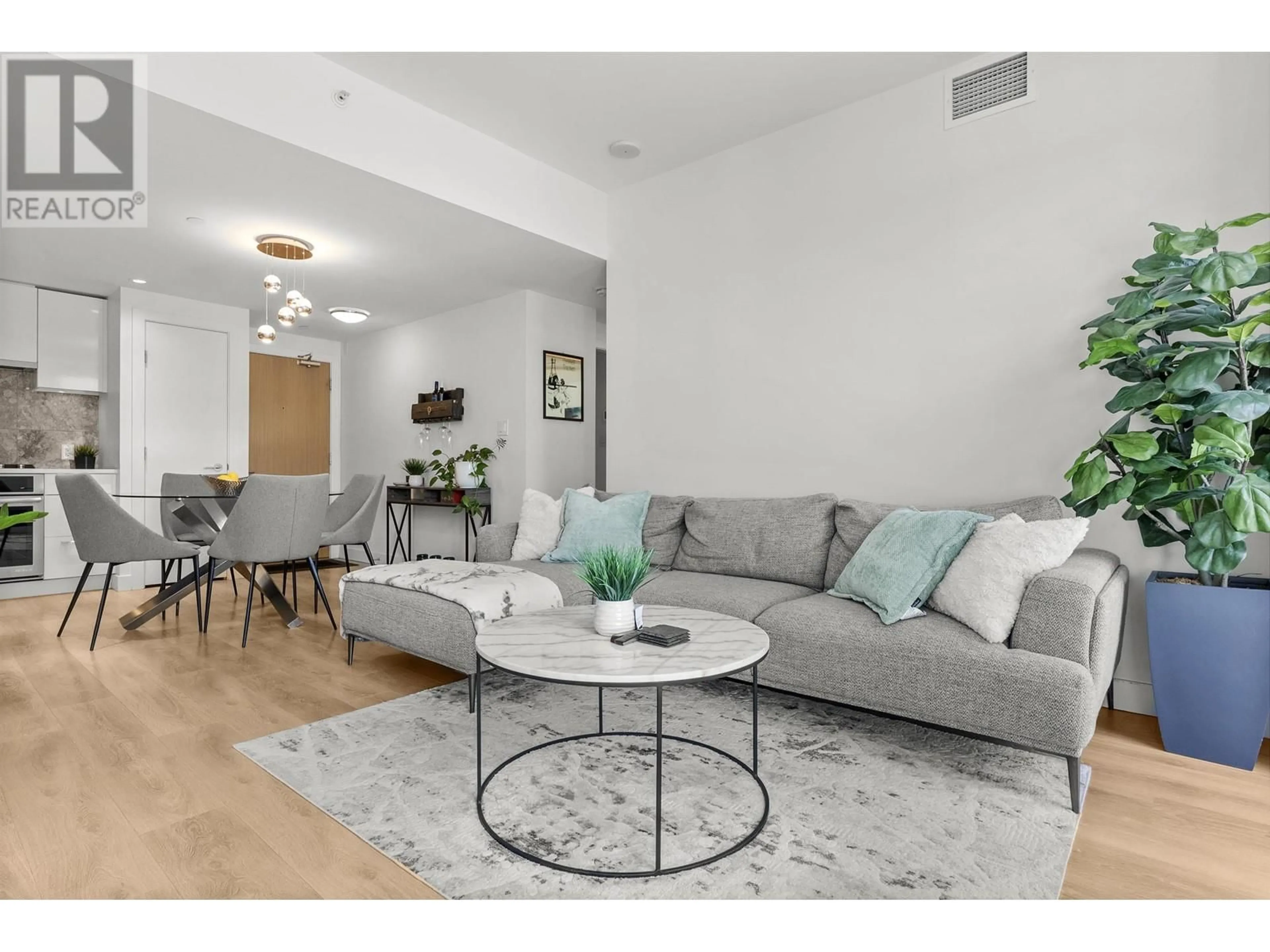 Living room with furniture, unknown for 205 - 3557 SAWMILL CRESCENT, Vancouver British Columbia V5S0E2