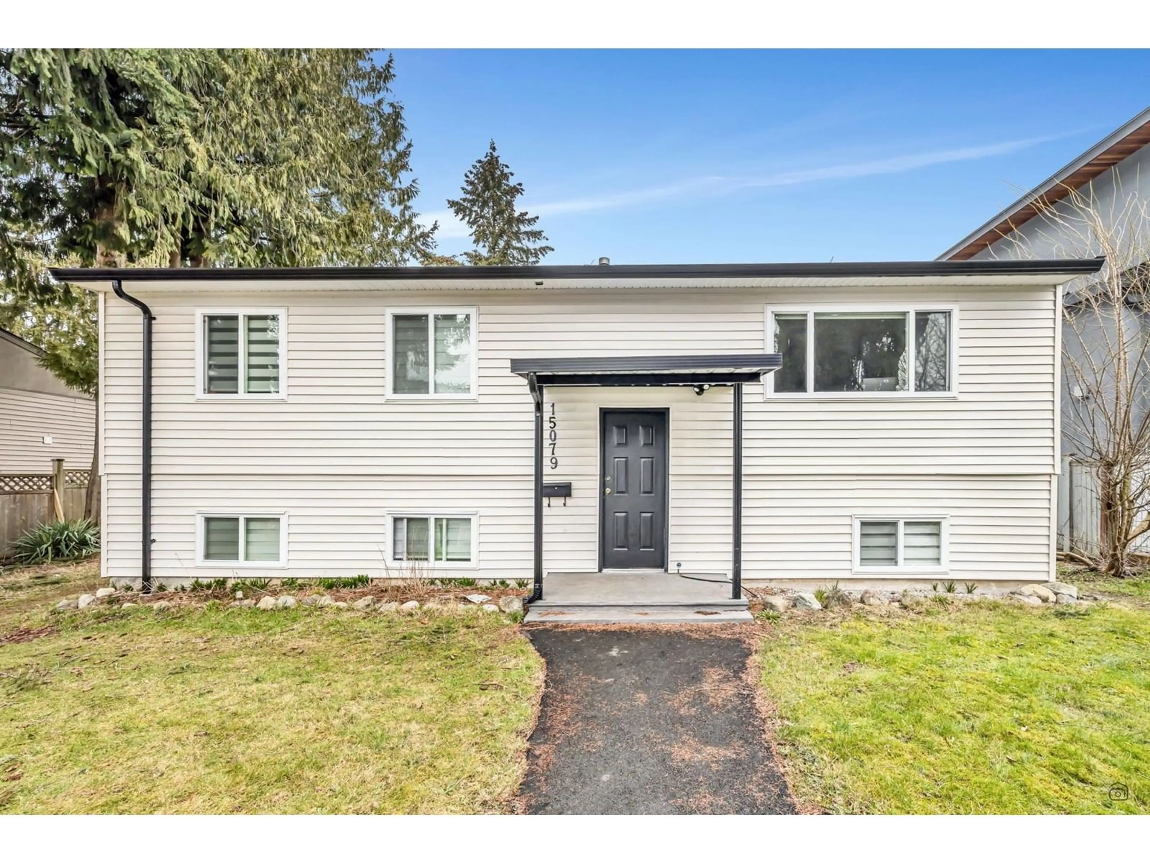 Home with vinyl exterior material, street for 15079 87B, Surrey British Columbia V3S5G6