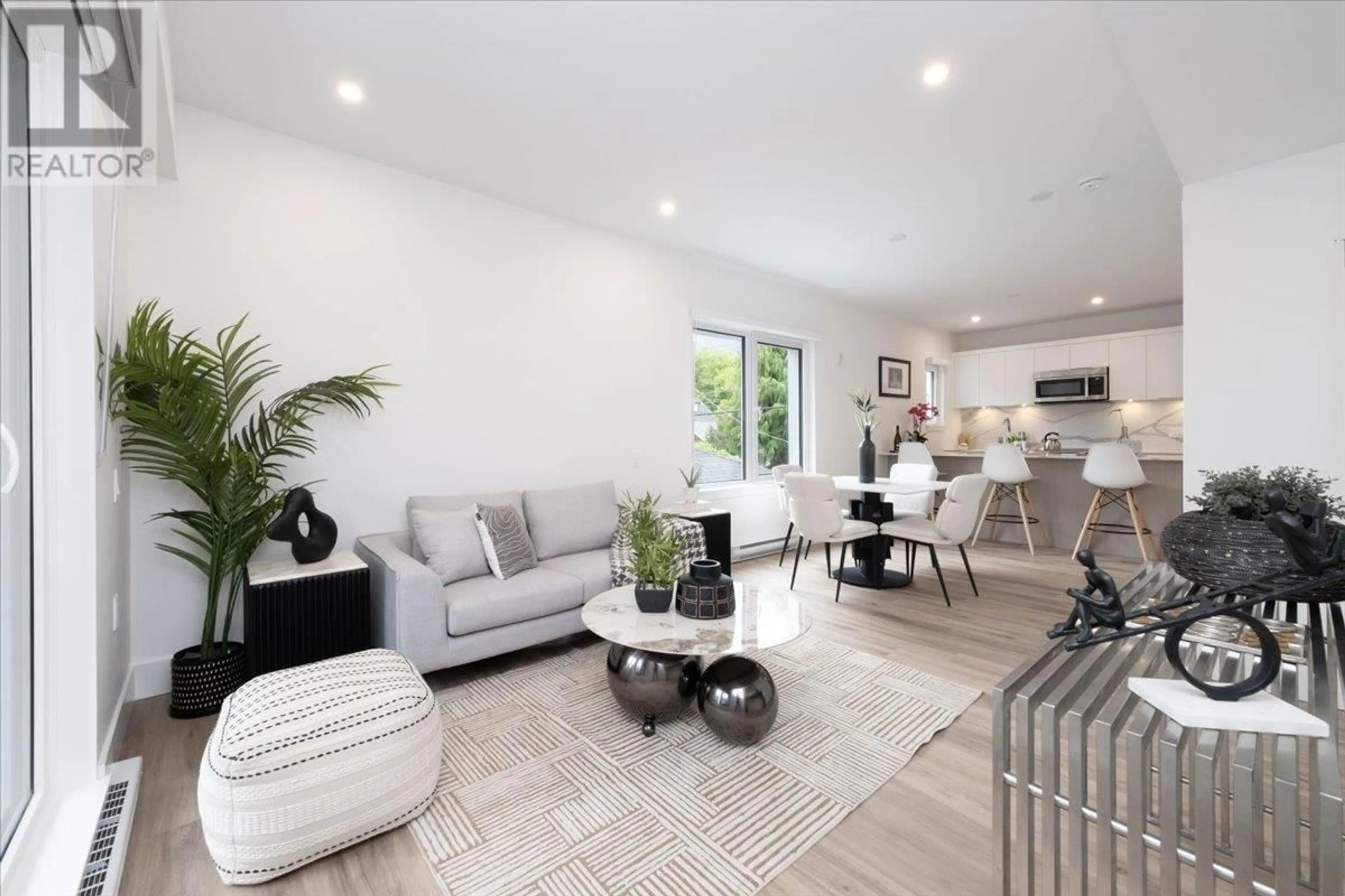 Living room with furniture, unknown for 205 - 2075 1ST AVENUE, Vancouver British Columbia V5N1B6