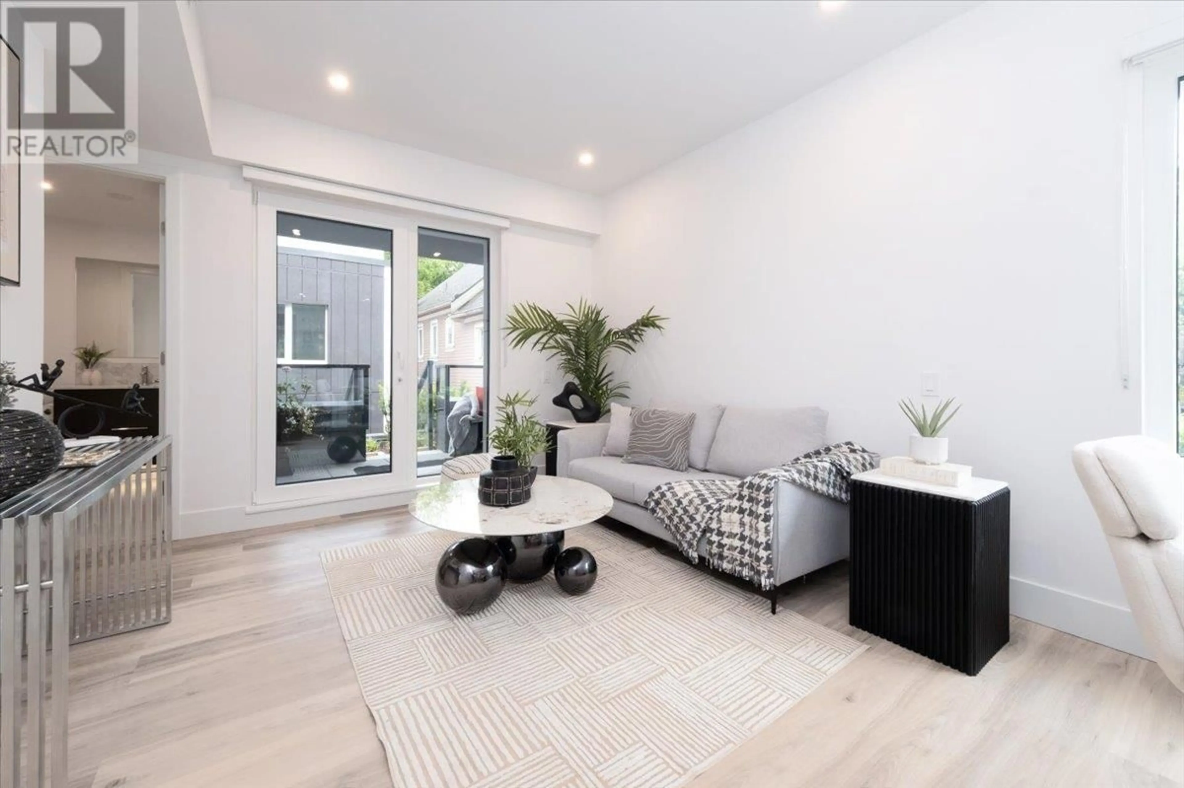 Living room with furniture, unknown for 205 - 2075 1ST AVENUE, Vancouver British Columbia V5N1B6