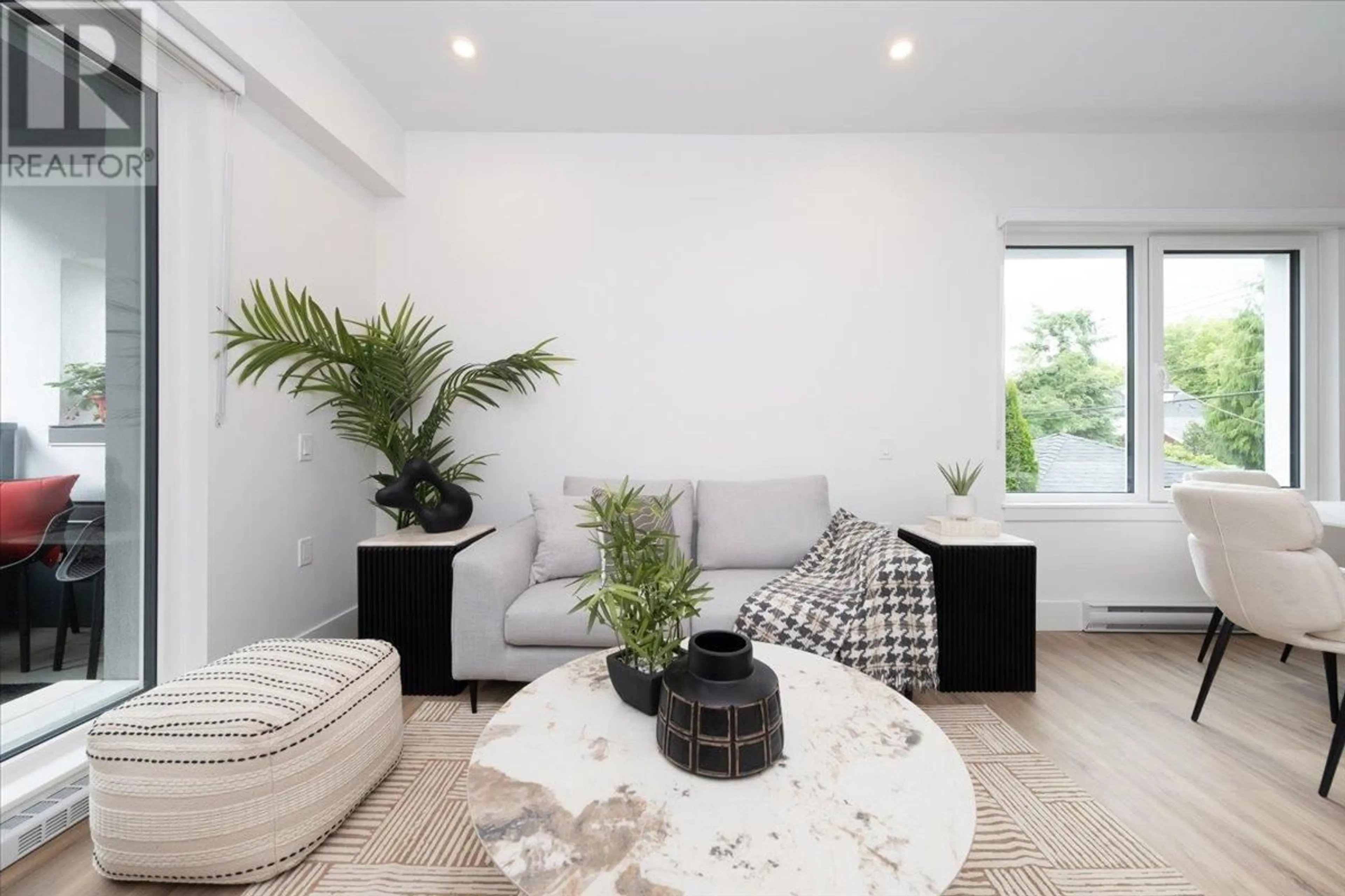 Living room with furniture, unknown for 205 - 2075 1ST AVENUE, Vancouver British Columbia V5N1B6