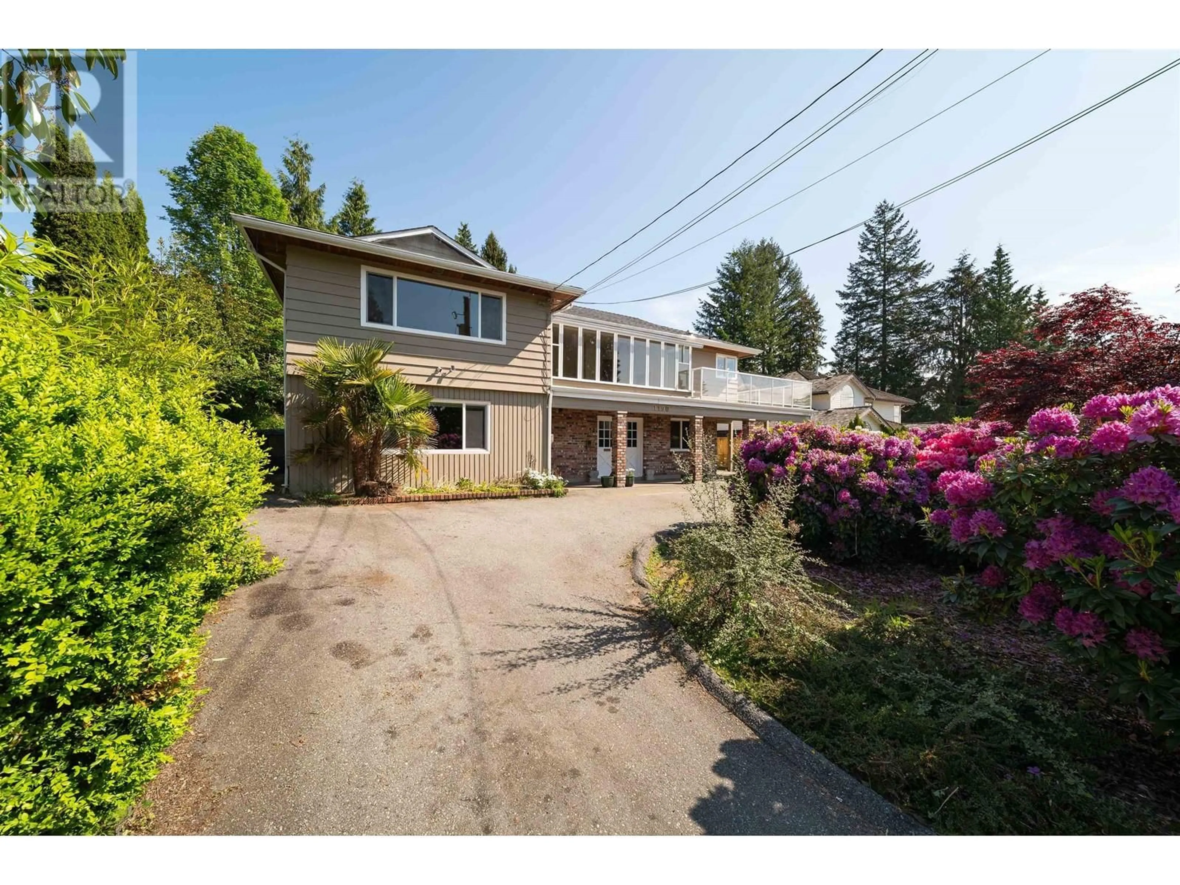 A pic from outside/outdoor area/front of a property/back of a property/a pic from drone, street for 1190 15TH STREET, North Vancouver British Columbia V7J1K7