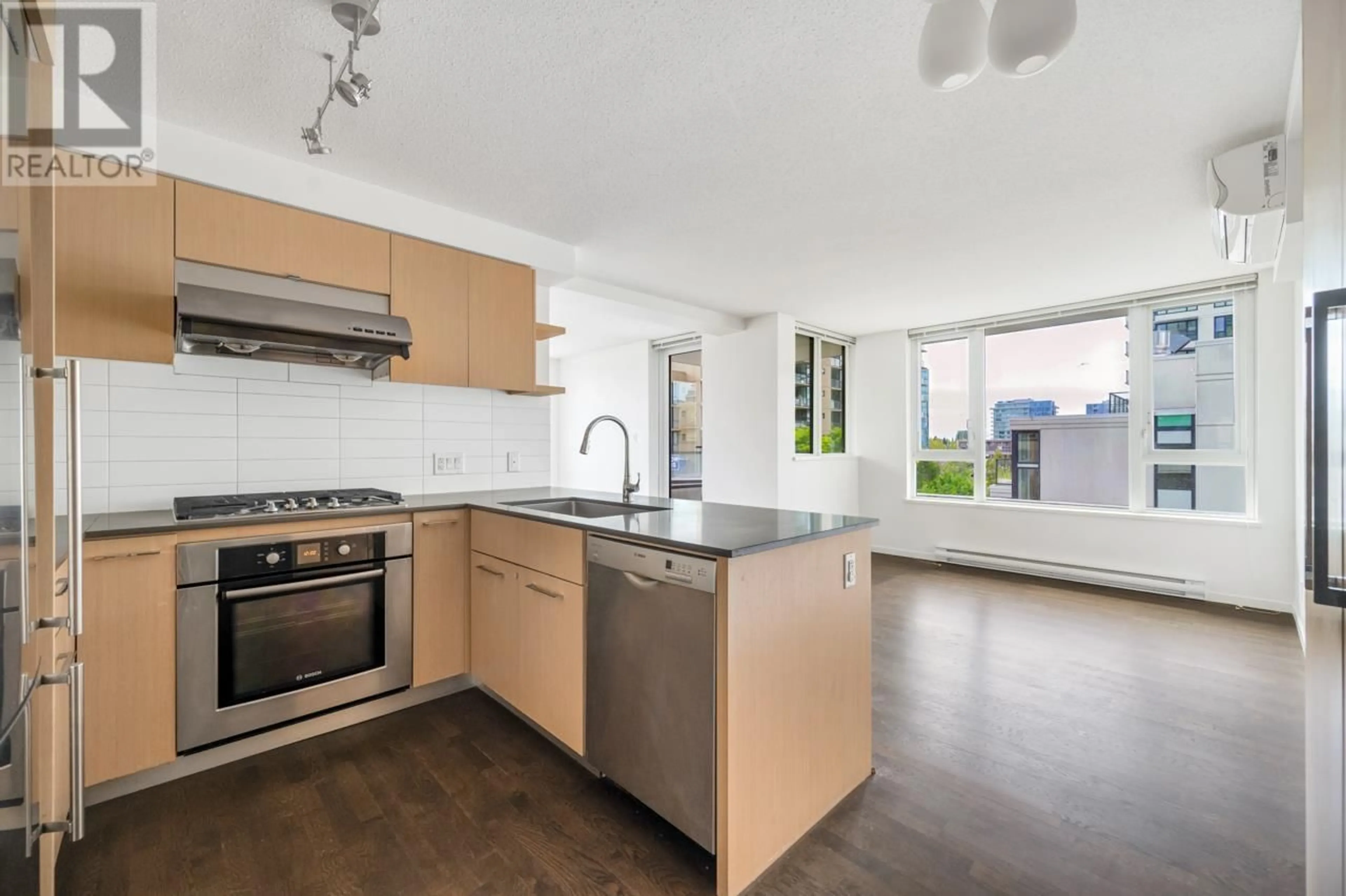 Open concept kitchen, unknown for 707 - 7979 FIRBRIDGE WAY, Richmond British Columbia V6X0K7