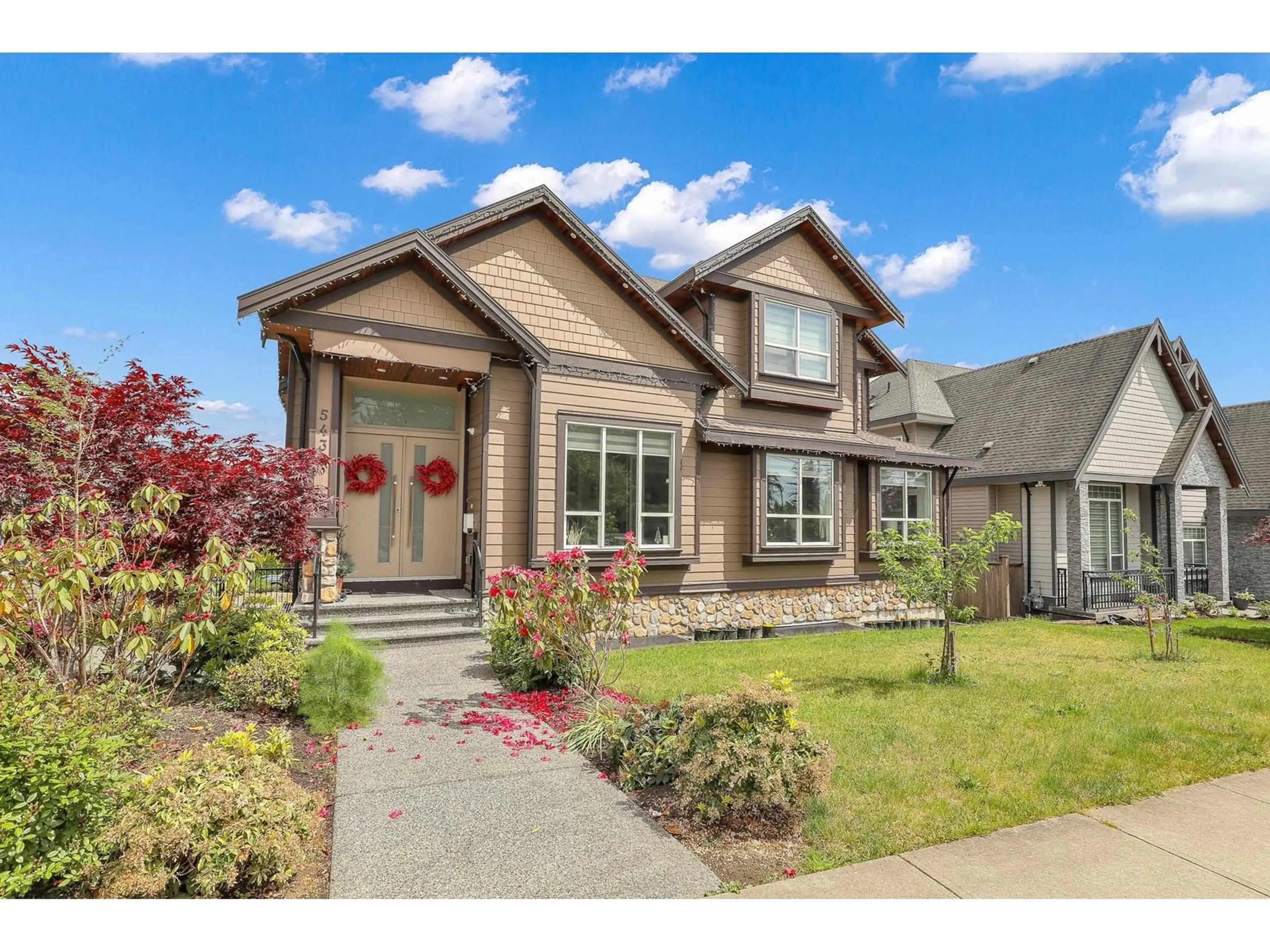 Home with vinyl exterior material, street for 5438 188, Surrey British Columbia V3S6R4