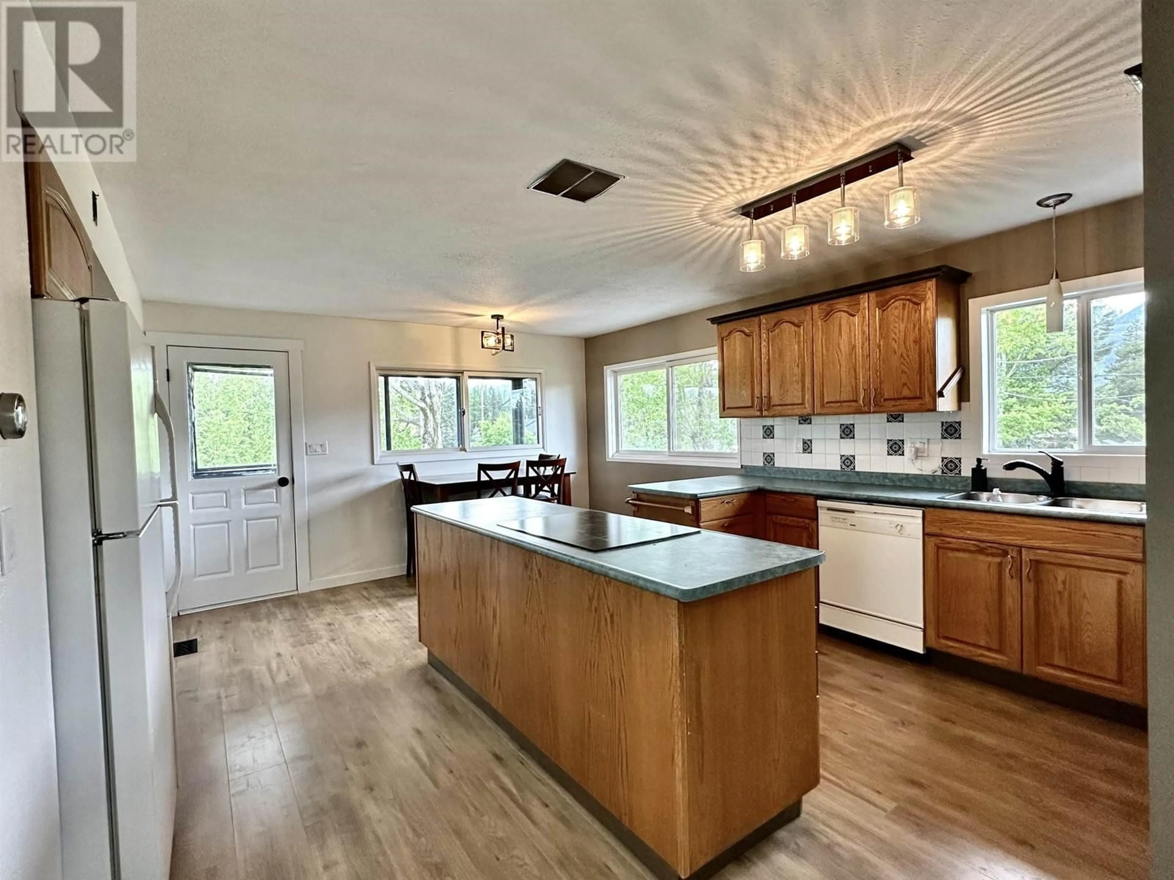 Open concept kitchen, unknown for 1915 CRANBERRY PLACE, Valemount British Columbia V0E2Z0