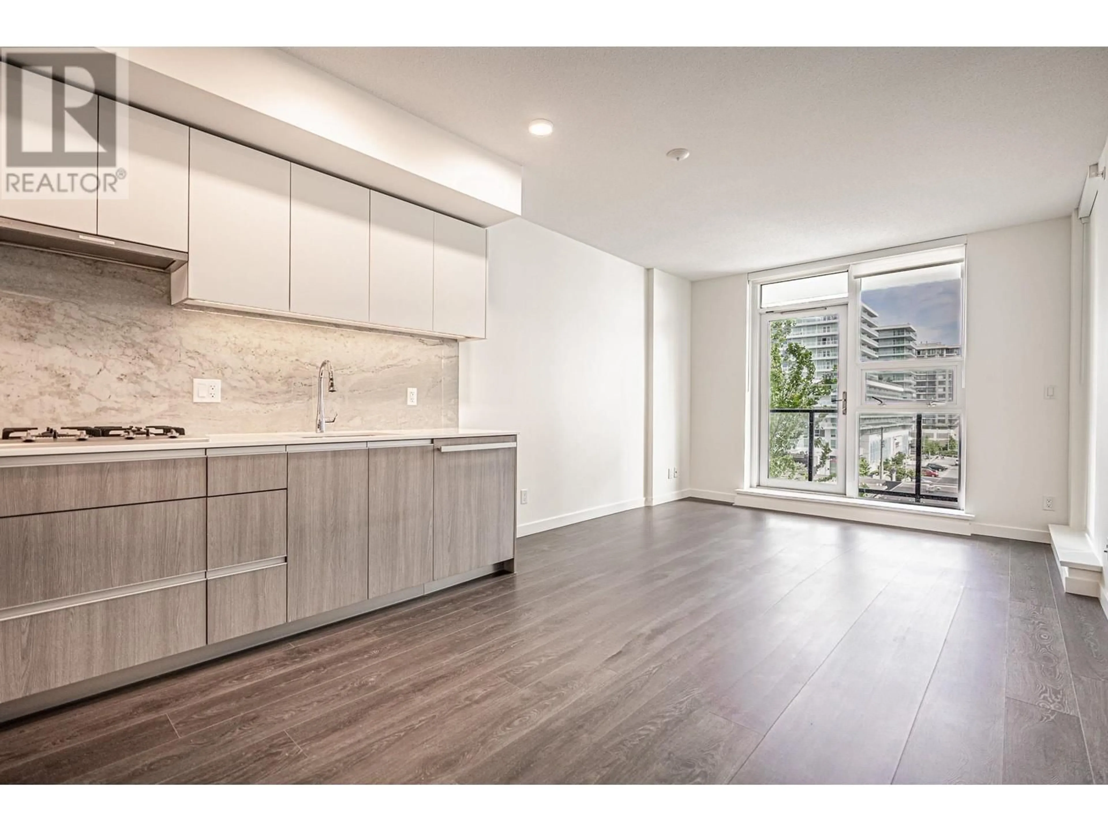 Open concept kitchen, wood/laminate floor for 607 - 6633 BUSWELL STREET, Richmond British Columbia V6Y0M3