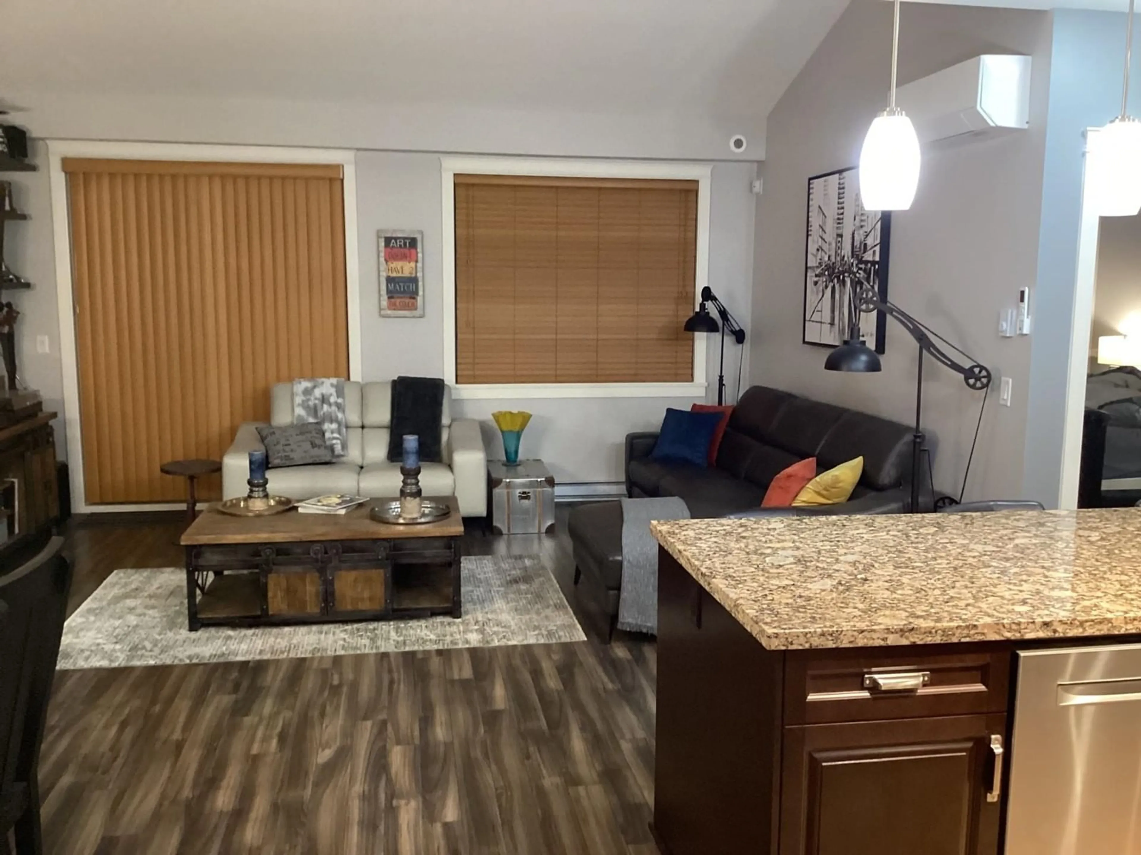 Living room with furniture, wood/laminate floor for B519 - 8218 207A, Langley British Columbia V2Y0Y1