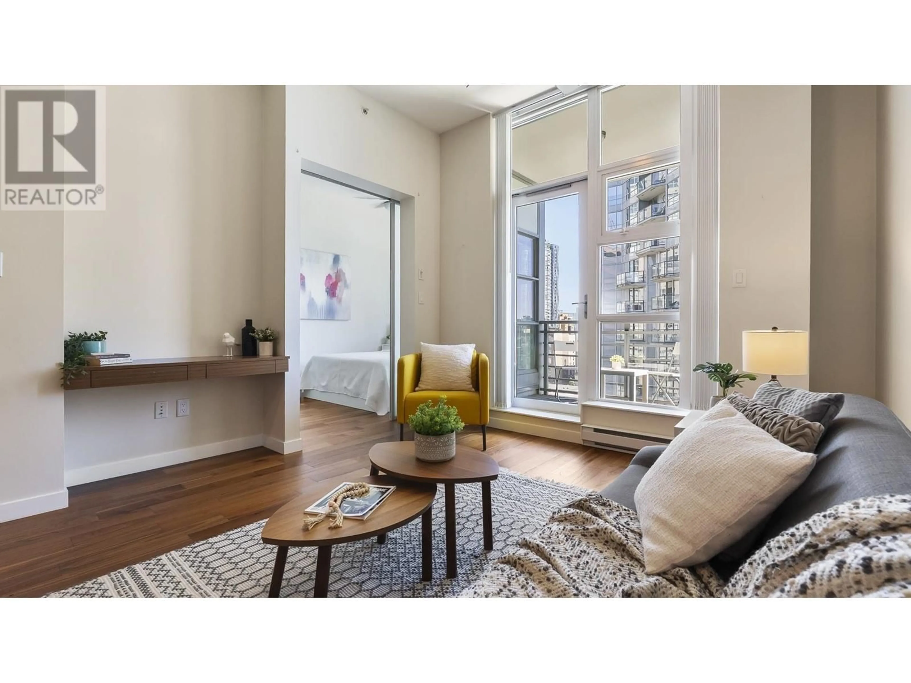 Living room with furniture, wood/laminate floor for 705 - 1205 HOWE STREET, Vancouver British Columbia V6Z0B2