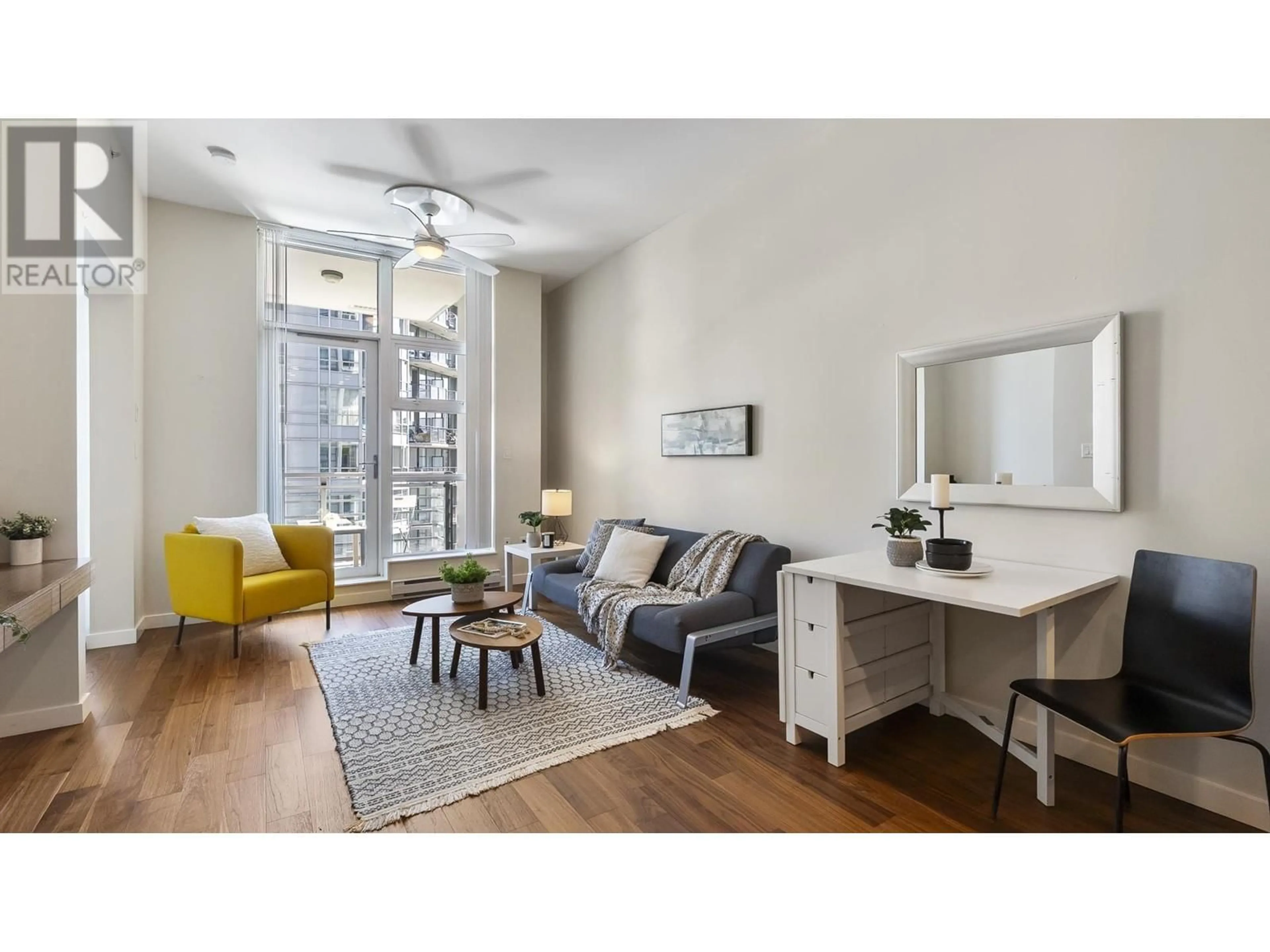 Living room with furniture, wood/laminate floor for 705 - 1205 HOWE STREET, Vancouver British Columbia V6Z0B2