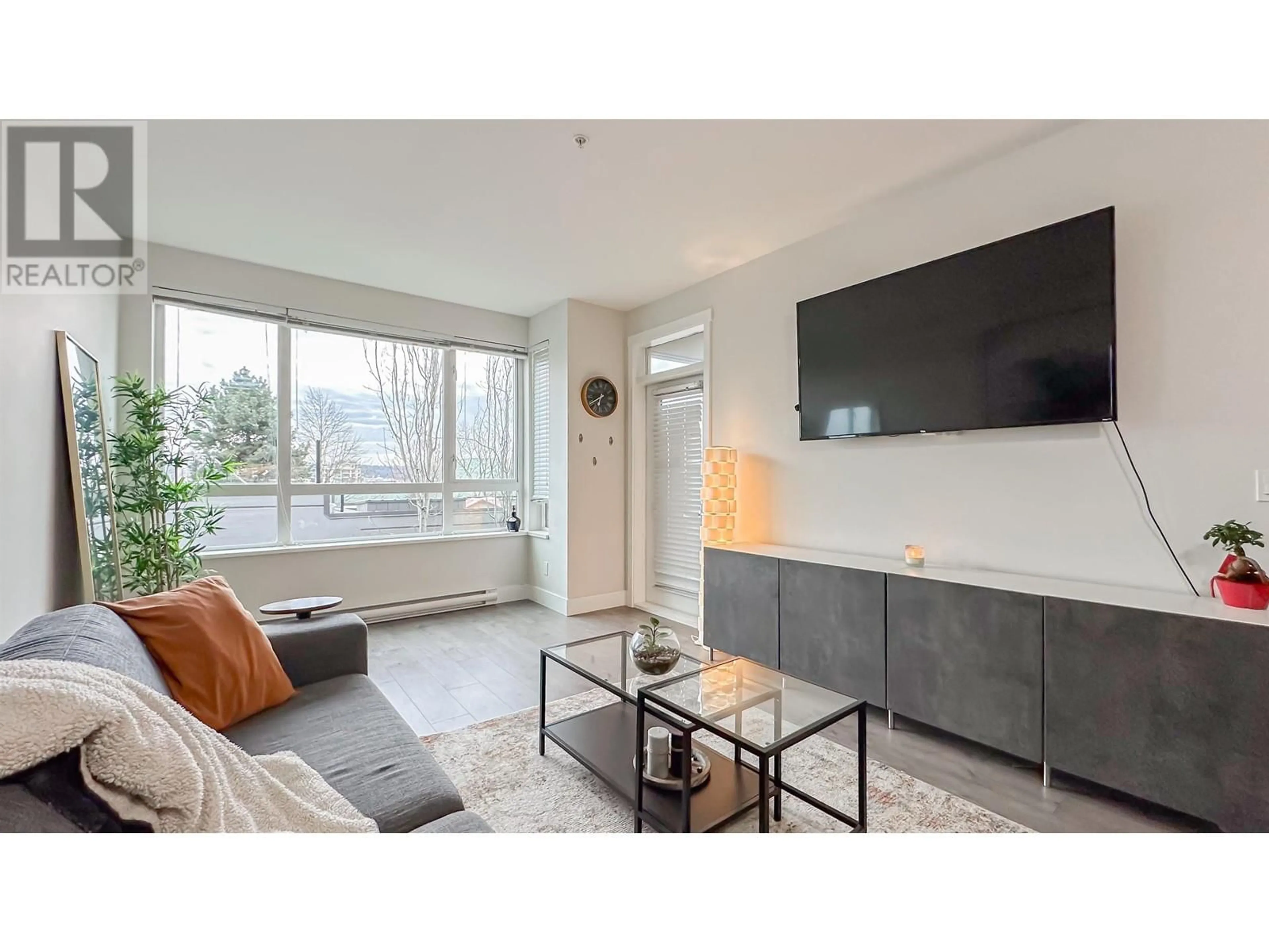 Living room with furniture, unknown for 203 - 1306 FIFTH AVENUE, New Westminster British Columbia V3M0K5