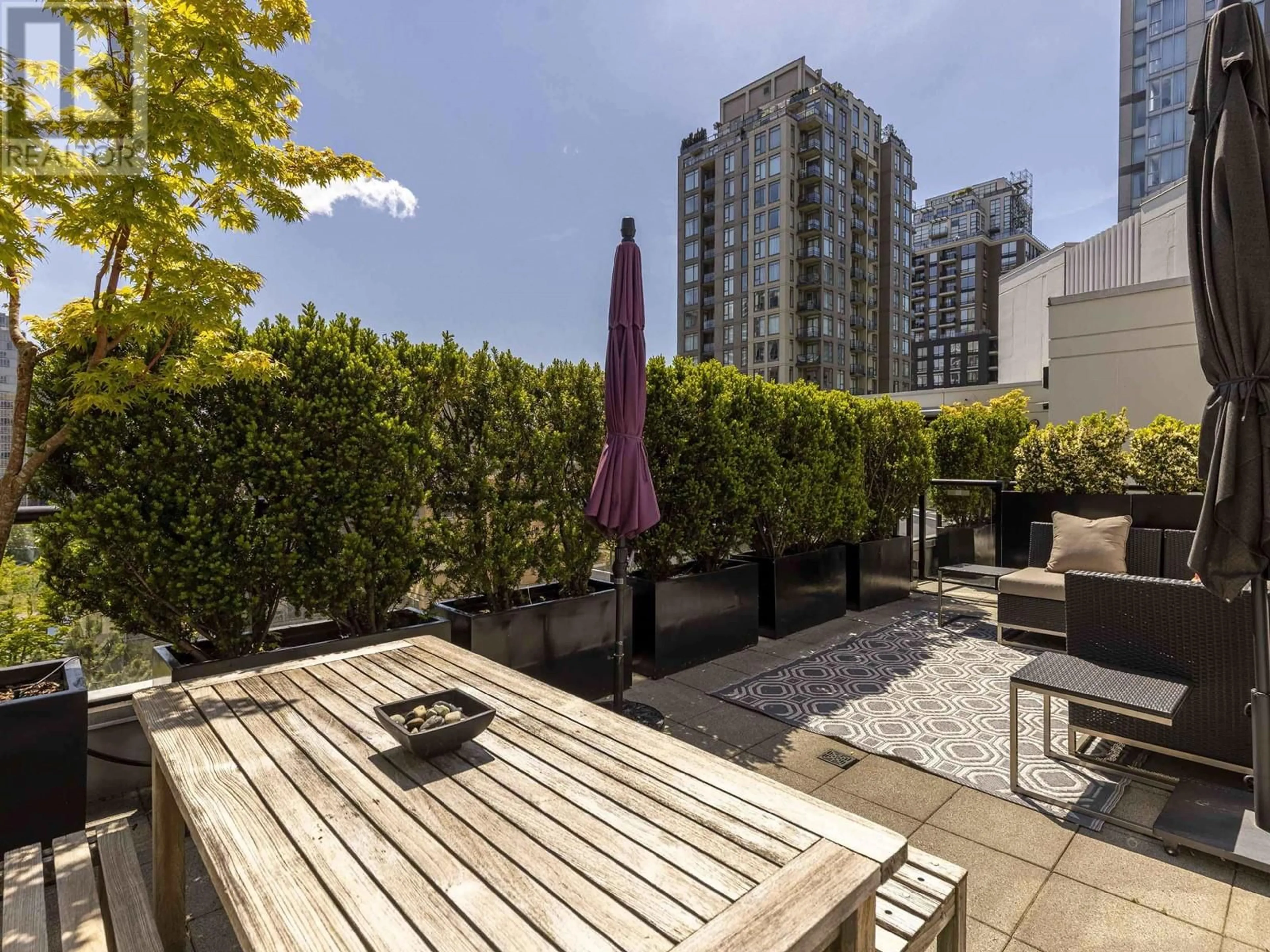 Patio, city buildings view from balcony for PH3 - 988 RICHARDS STREET, Vancouver British Columbia V6B8R2