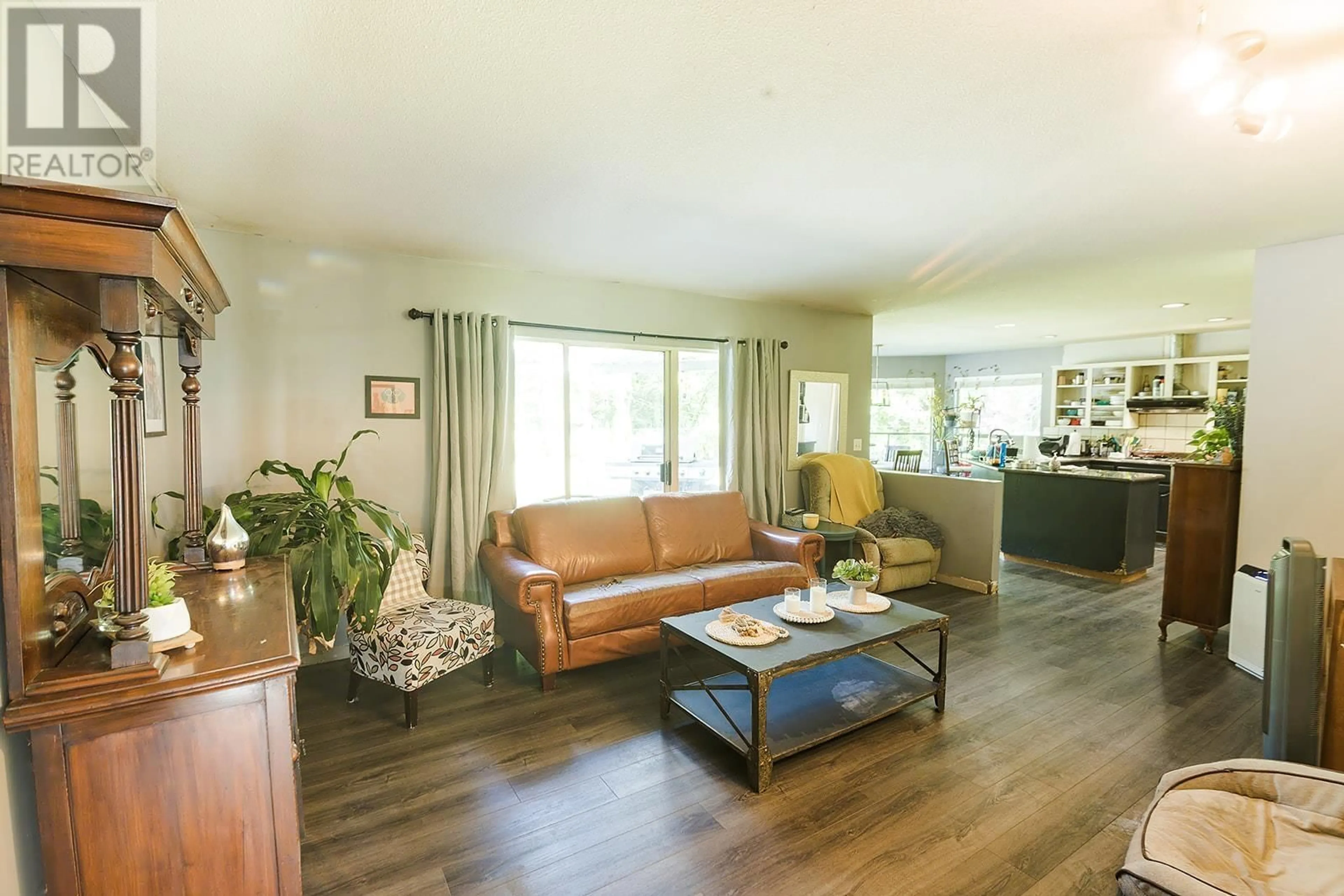 Living room with furniture, wood/laminate floor for 12486 256TH STREET, Maple Ridge British Columbia V4R1C1