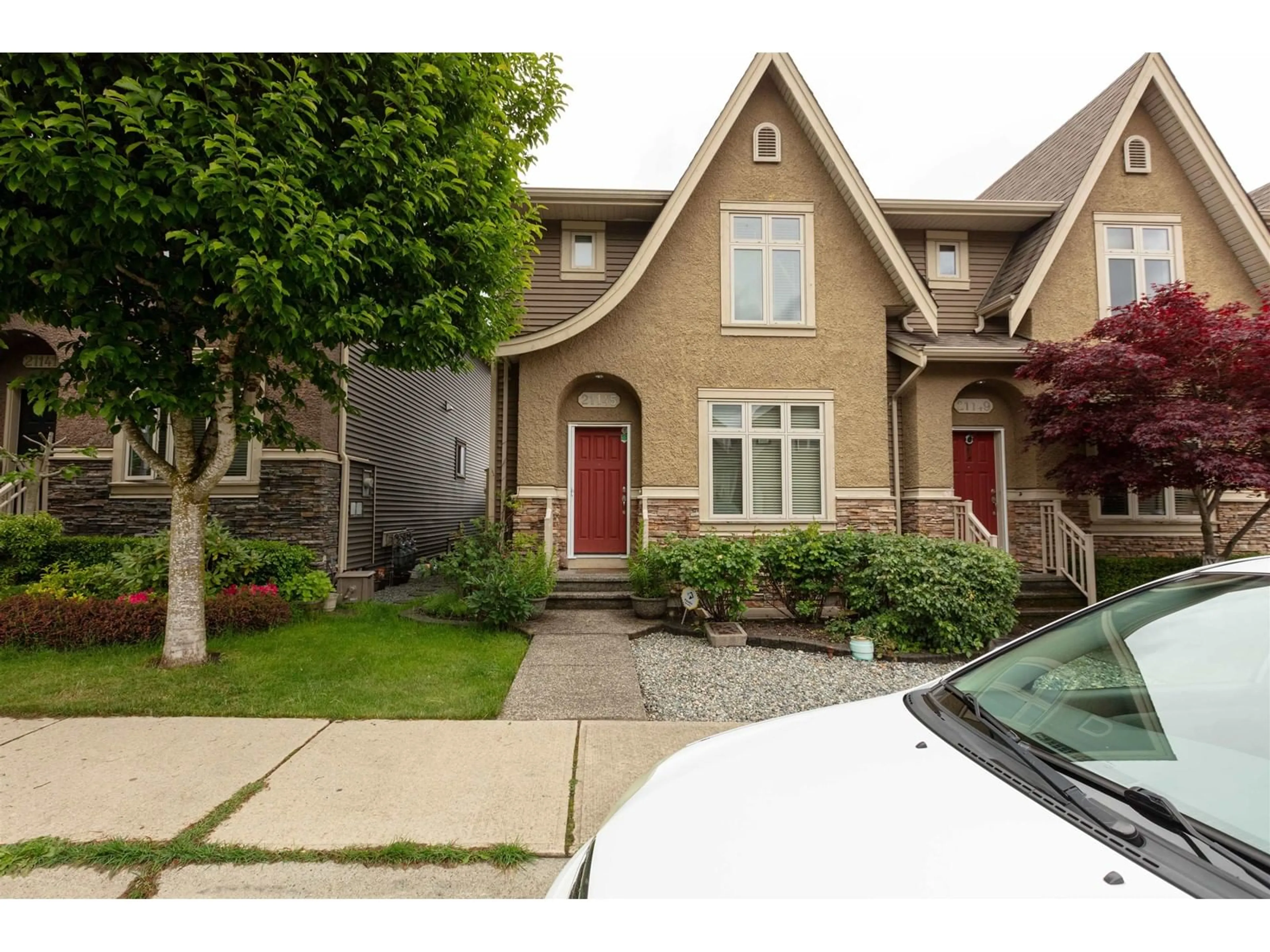 Home with brick exterior material, street for 21145 77B, Langley British Columbia V2Y0J3