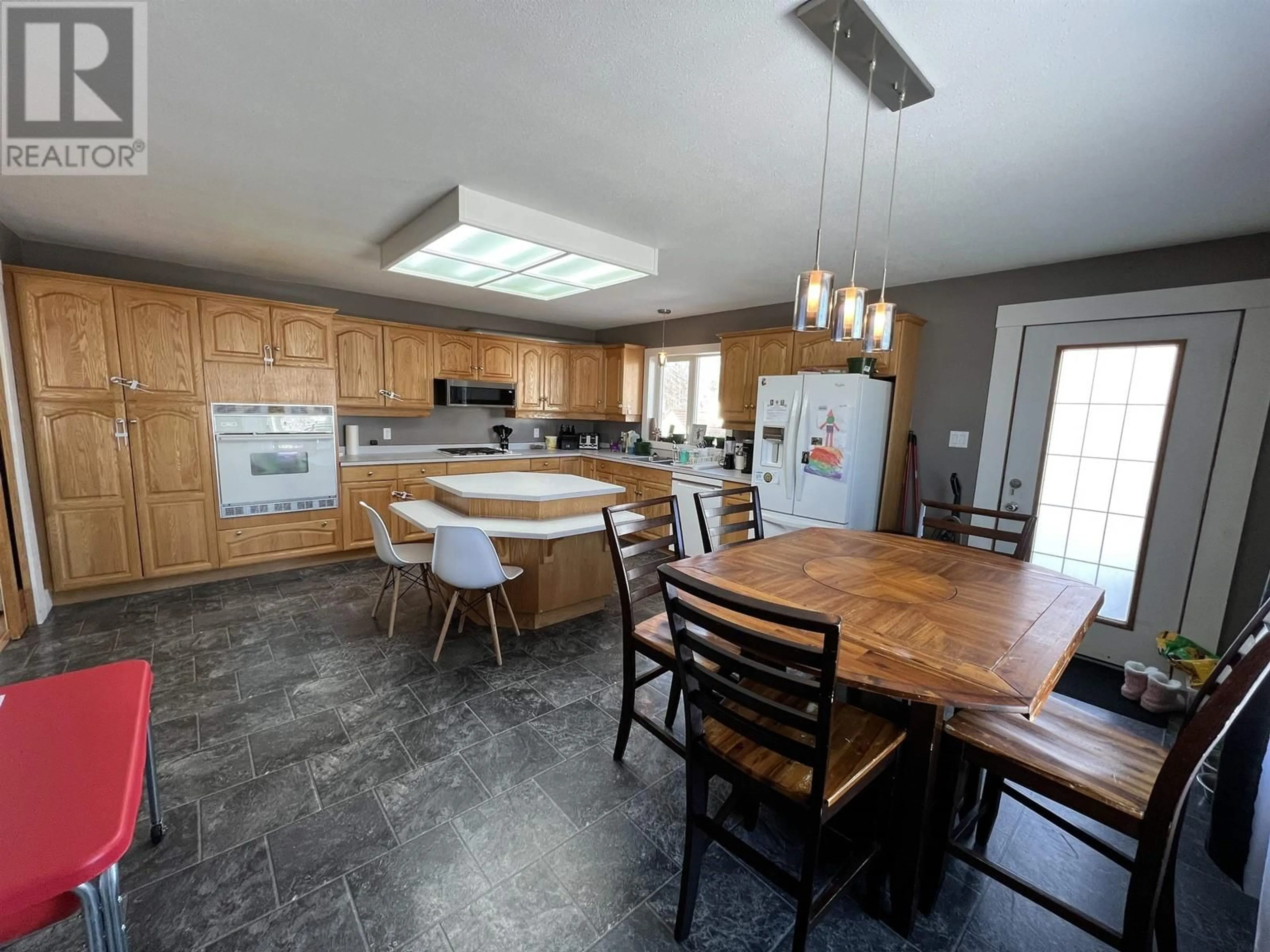 Open concept kitchen, unknown for 3912 COTTONWOOD ROAD, Fort Nelson British Columbia V0C1R0