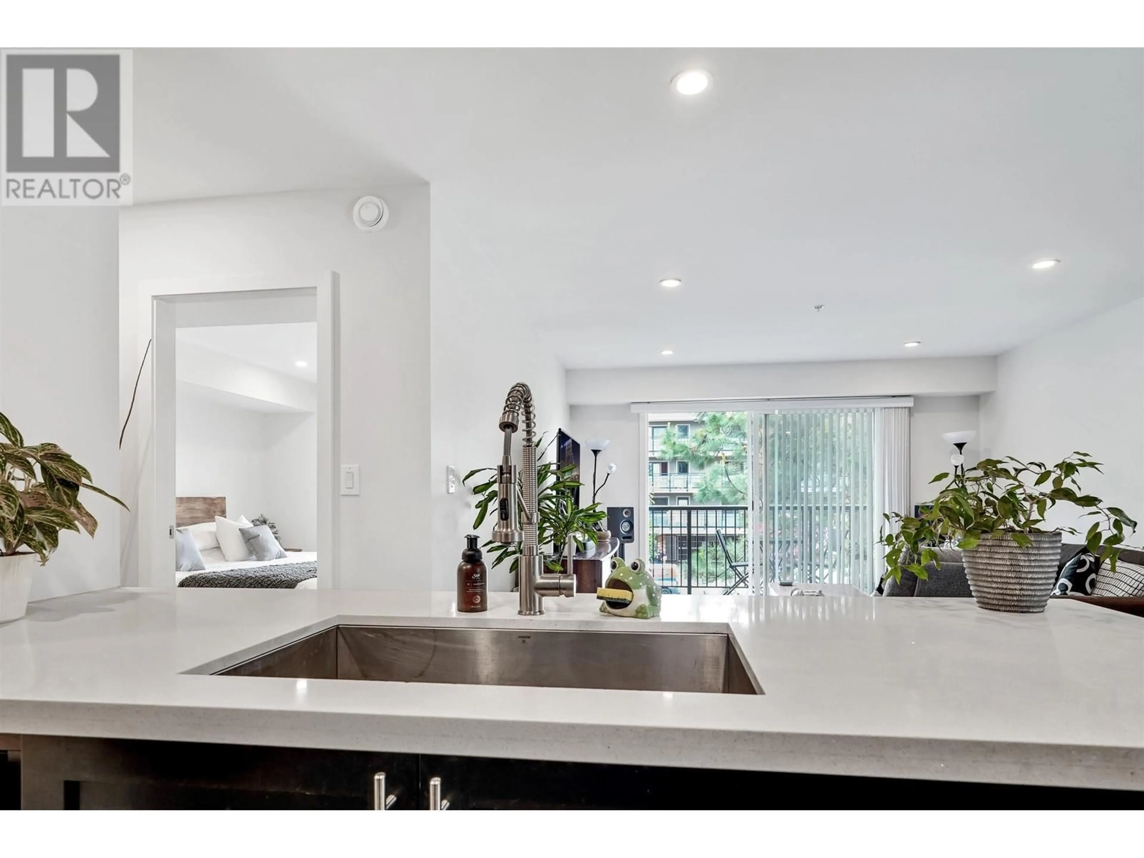 Open concept kitchen, ceramic/tile floor for 302 - 357 2ND STREET, North Vancouver British Columbia V7L1C6