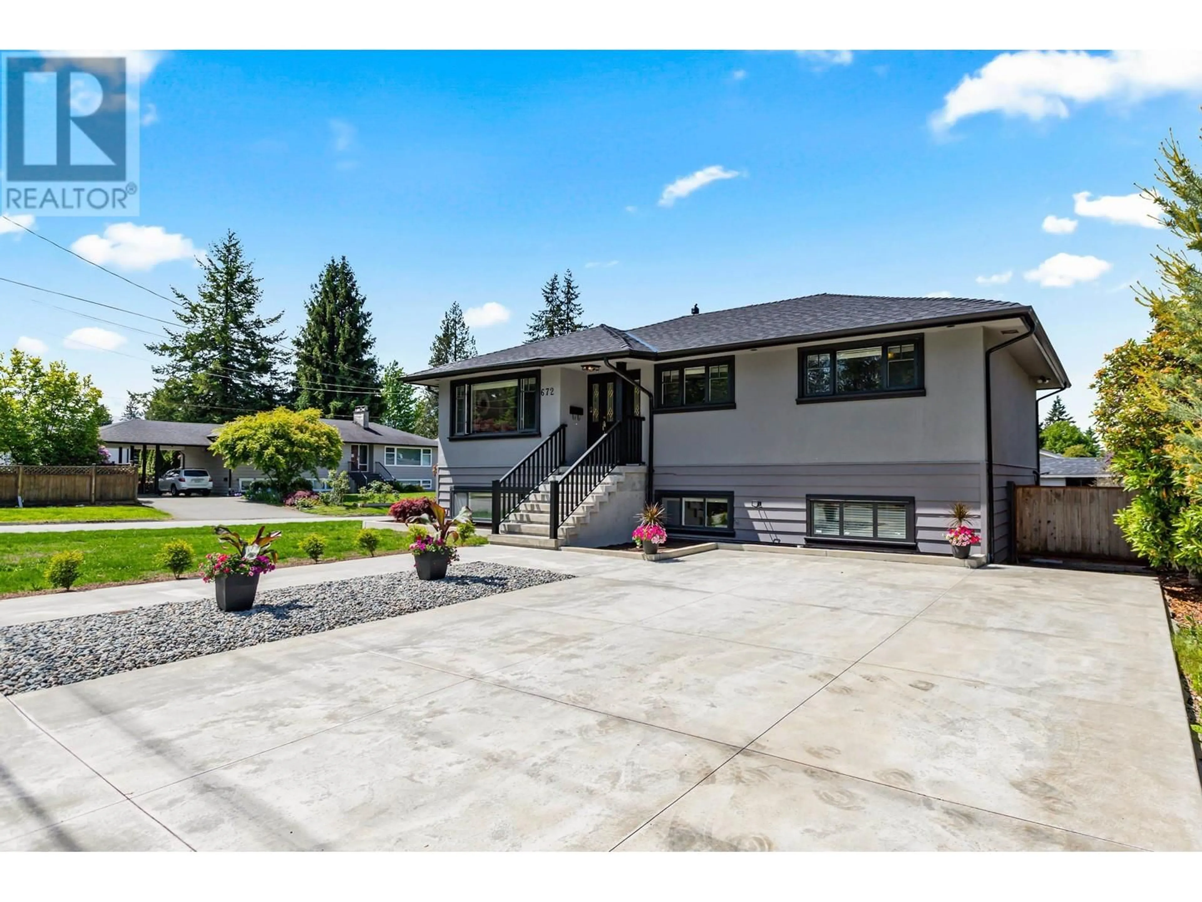 Home with vinyl exterior material, street for 672 WILMOT STREET, Coquitlam British Columbia V3J6P4