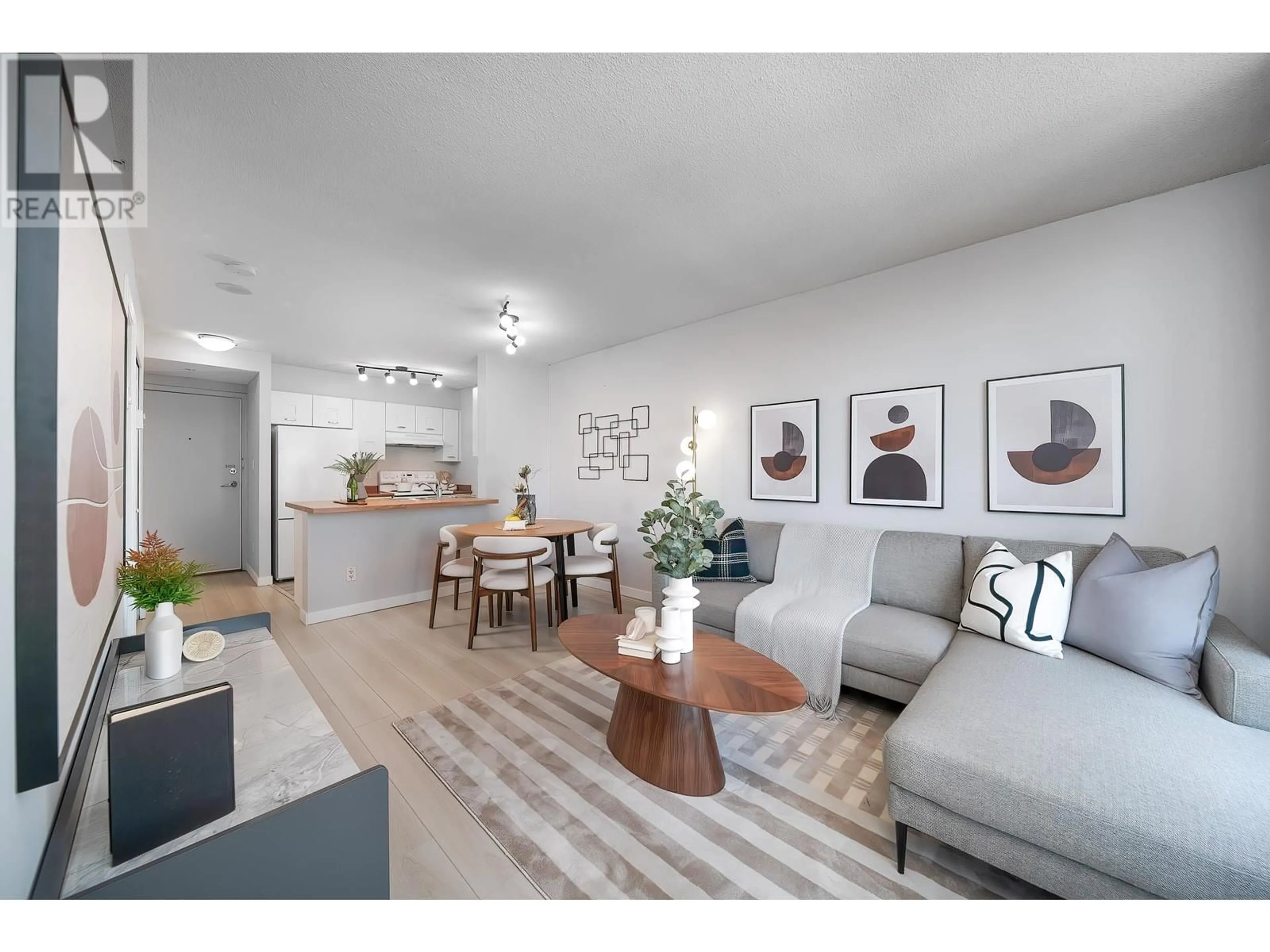 Living room with furniture, wood/laminate floor for 1606 - 3438 VANNESS AVENUE, Vancouver British Columbia V5R6E7