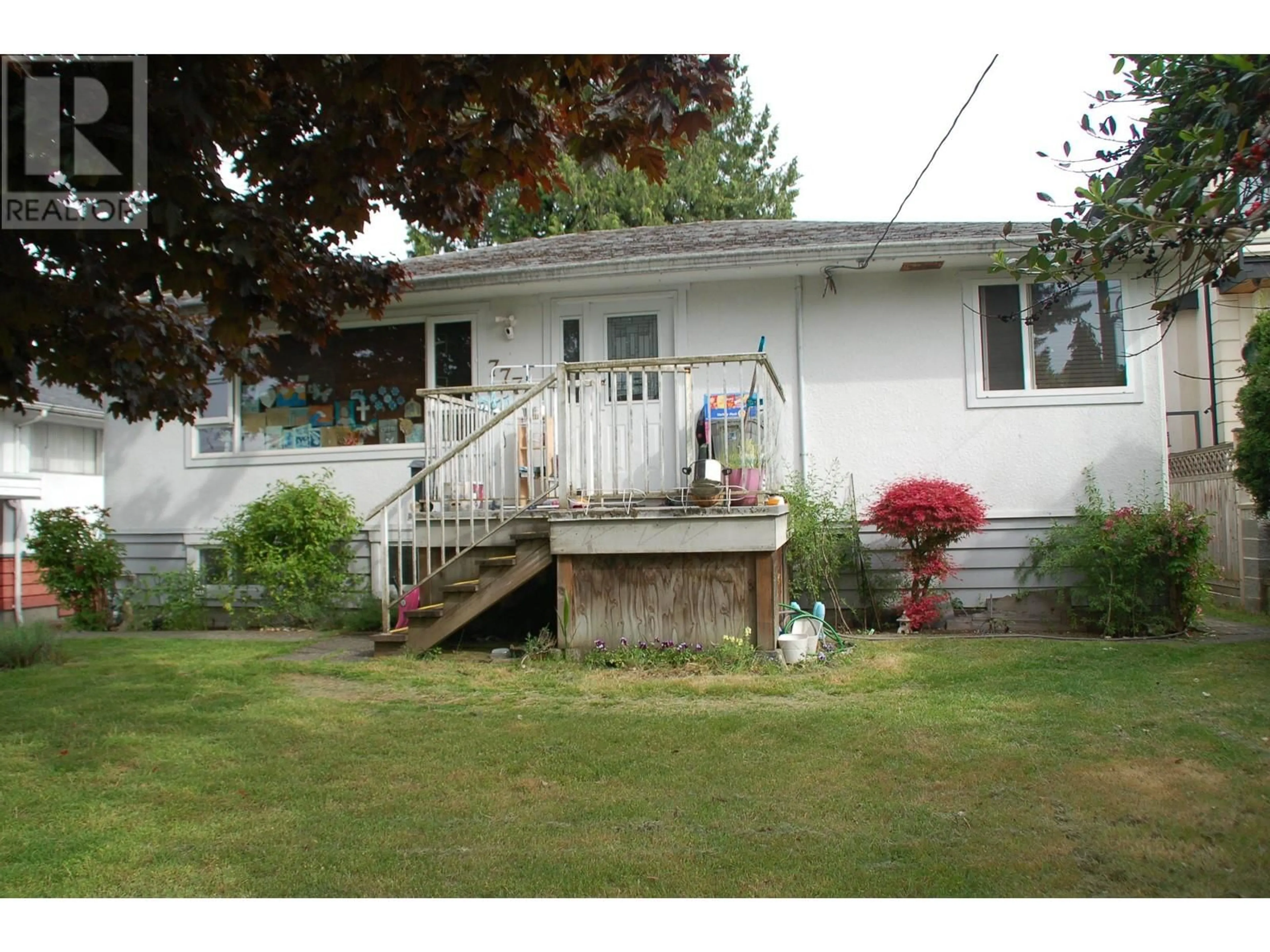 Home with vinyl exterior material, street for 7774 ROSEWOOD STREET, Burnaby British Columbia V5E2H1