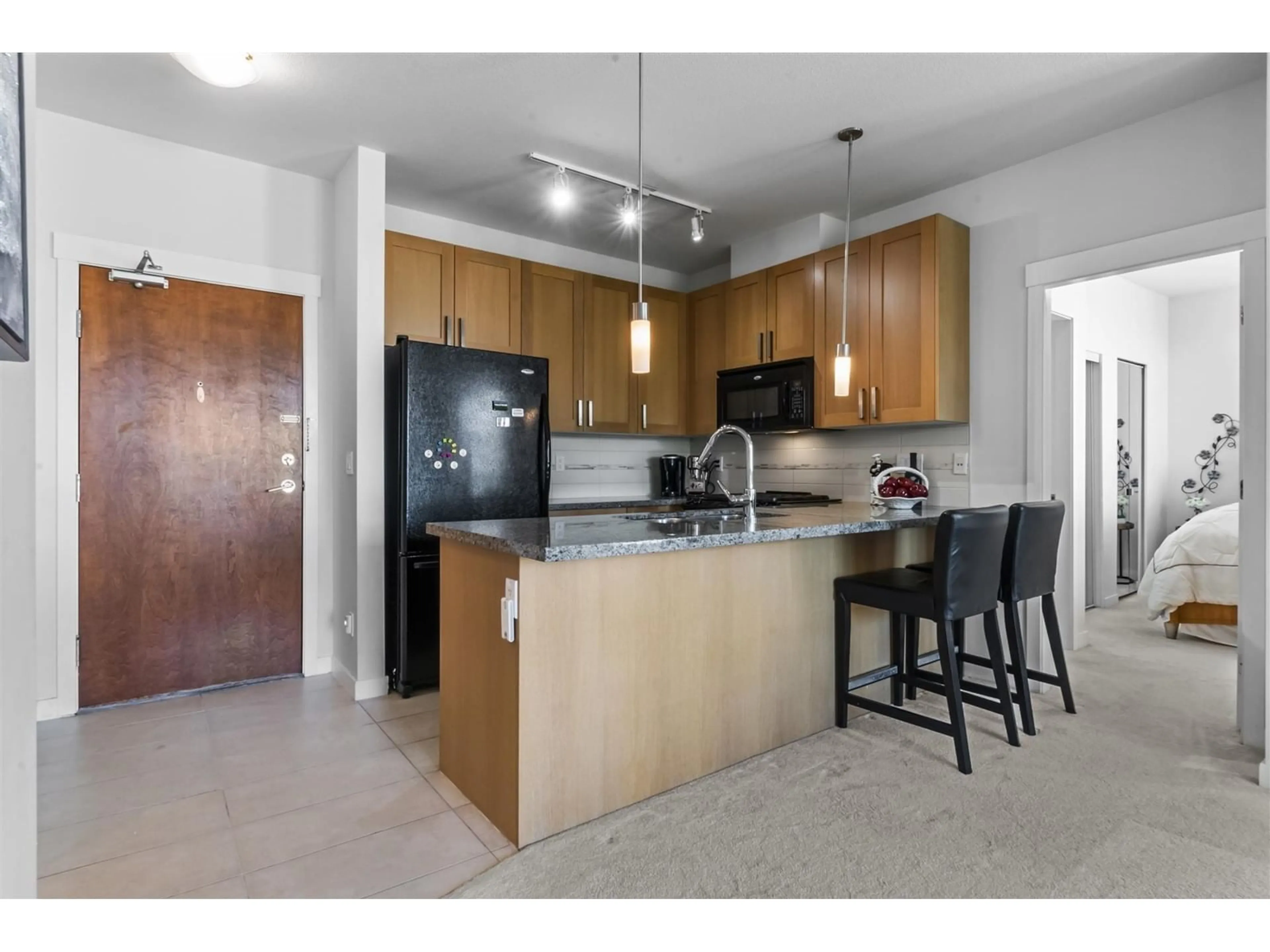 Open concept kitchen, unknown for 332 - 15918 26, Surrey British Columbia V3Z5K3