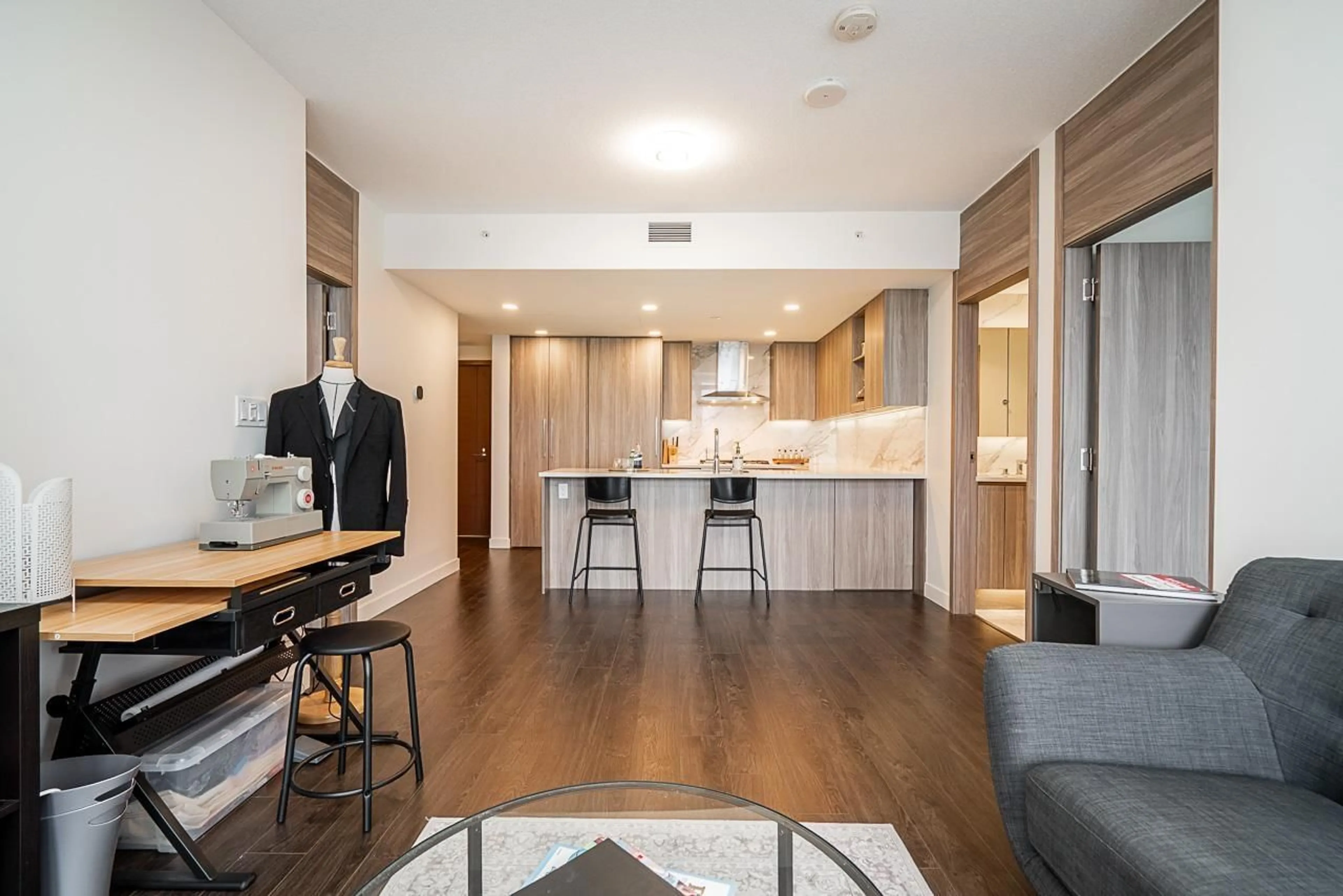 Open concept kitchen, wood/laminate floor for 903 - 9887 WHALLEY, Surrey British Columbia V3T0P4
