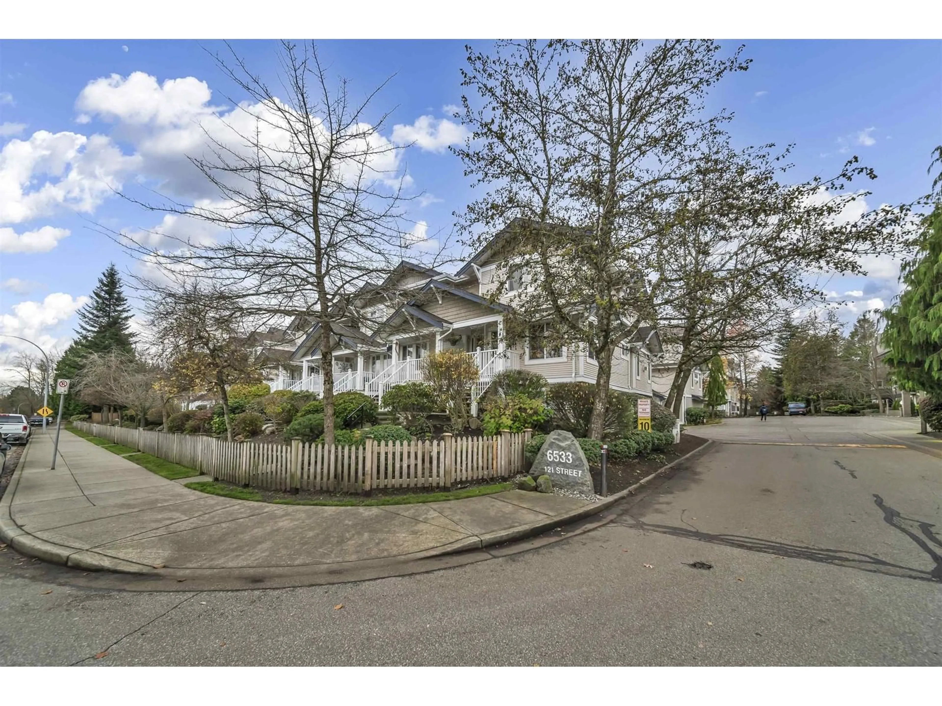A pic from outside/outdoor area/front of a property/back of a property/a pic from drone, street for 75 - 6533 121, Surrey British Columbia V3W1M5