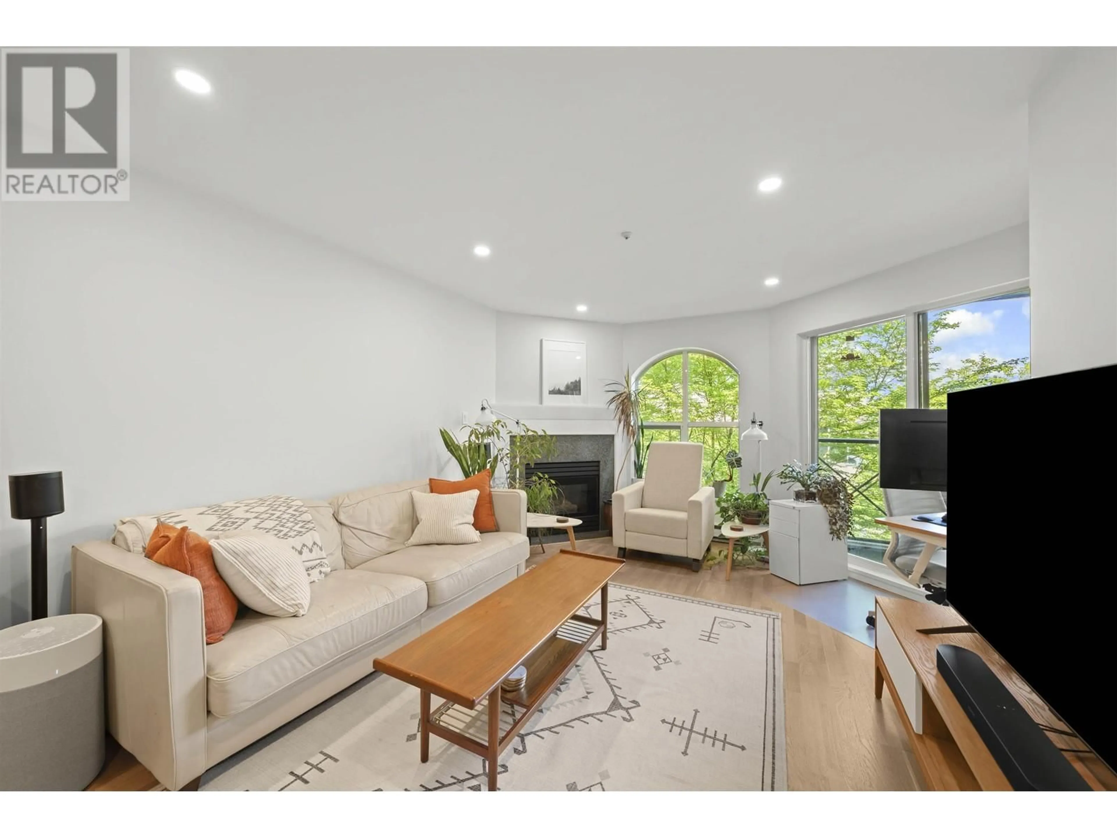 Living room with furniture, wood/laminate floor for 318 - 511 7TH AVENUE, Vancouver British Columbia V5Z4R2
