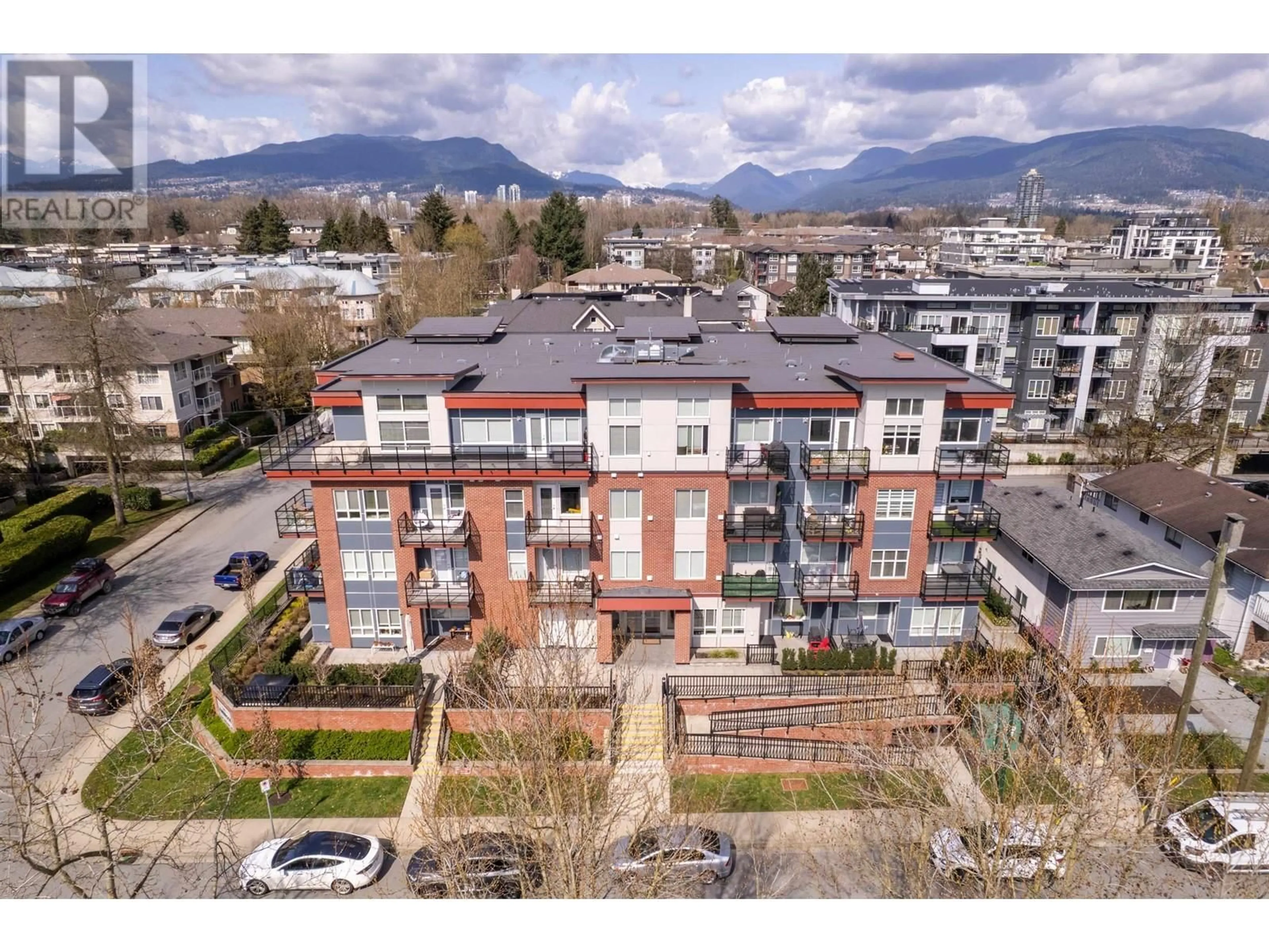 A pic from outside/outdoor area/front of a property/back of a property/a pic from drone, mountain view for 204 - 2389 HAWTHORNE AVENUE, Port Coquitlam British Columbia V3C1X1
