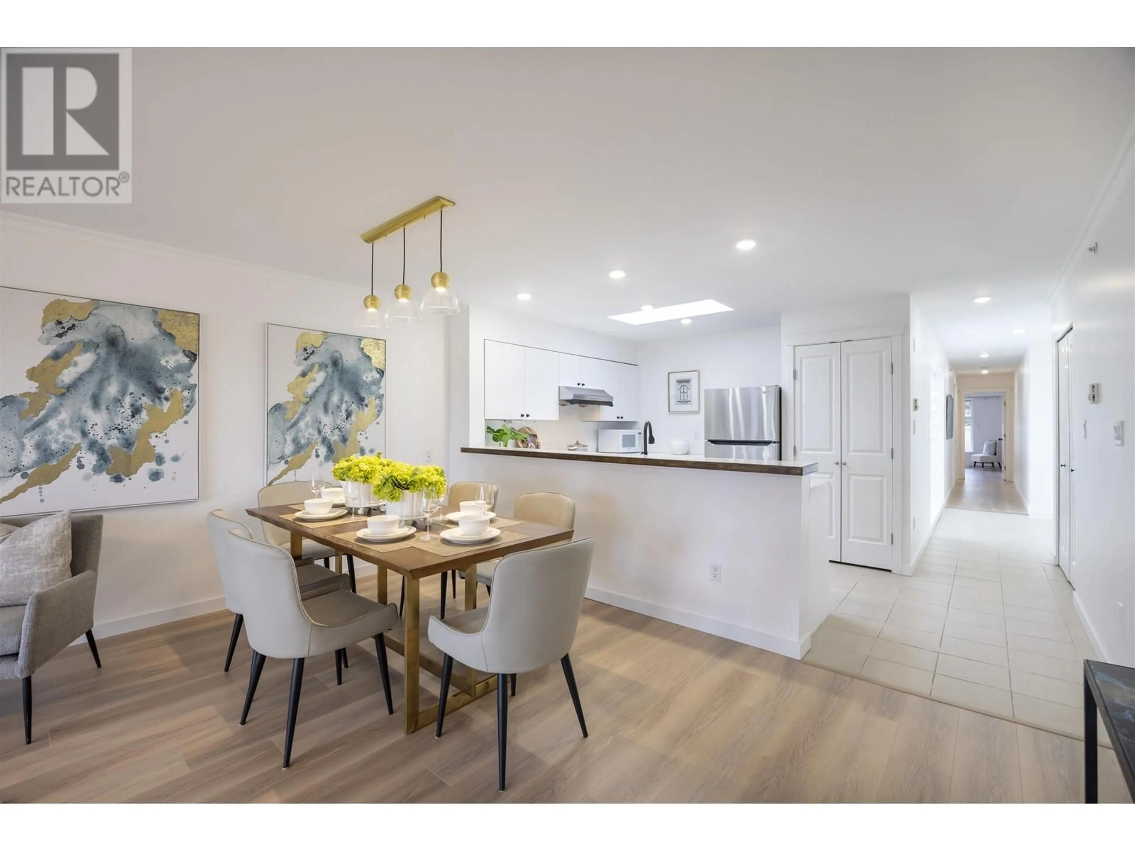 Open concept kitchen, unknown for 409 - 3580 W 41TH AVENUE, Vancouver British Columbia V6N3E6