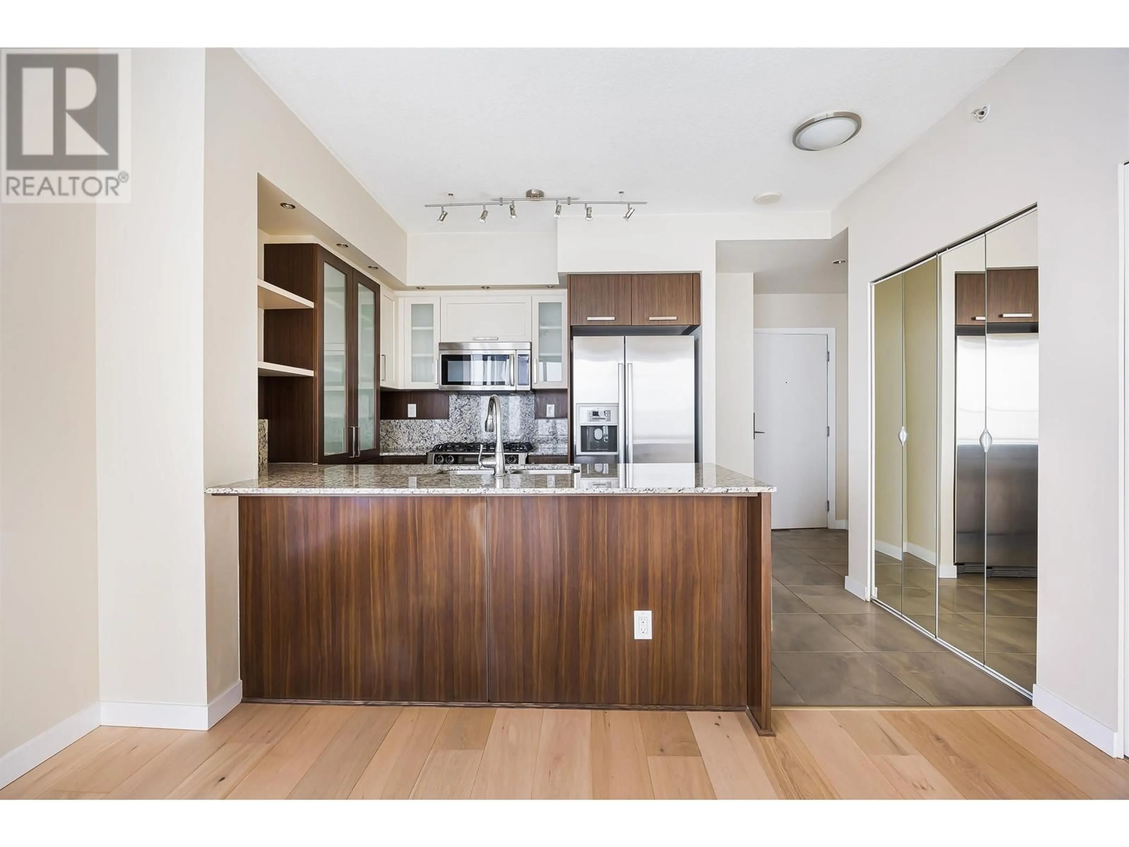 Open concept kitchen, wood/laminate floor for 2905 - 2980 ATLANTIC AVENUE, Coquitlam British Columbia V3B0G2