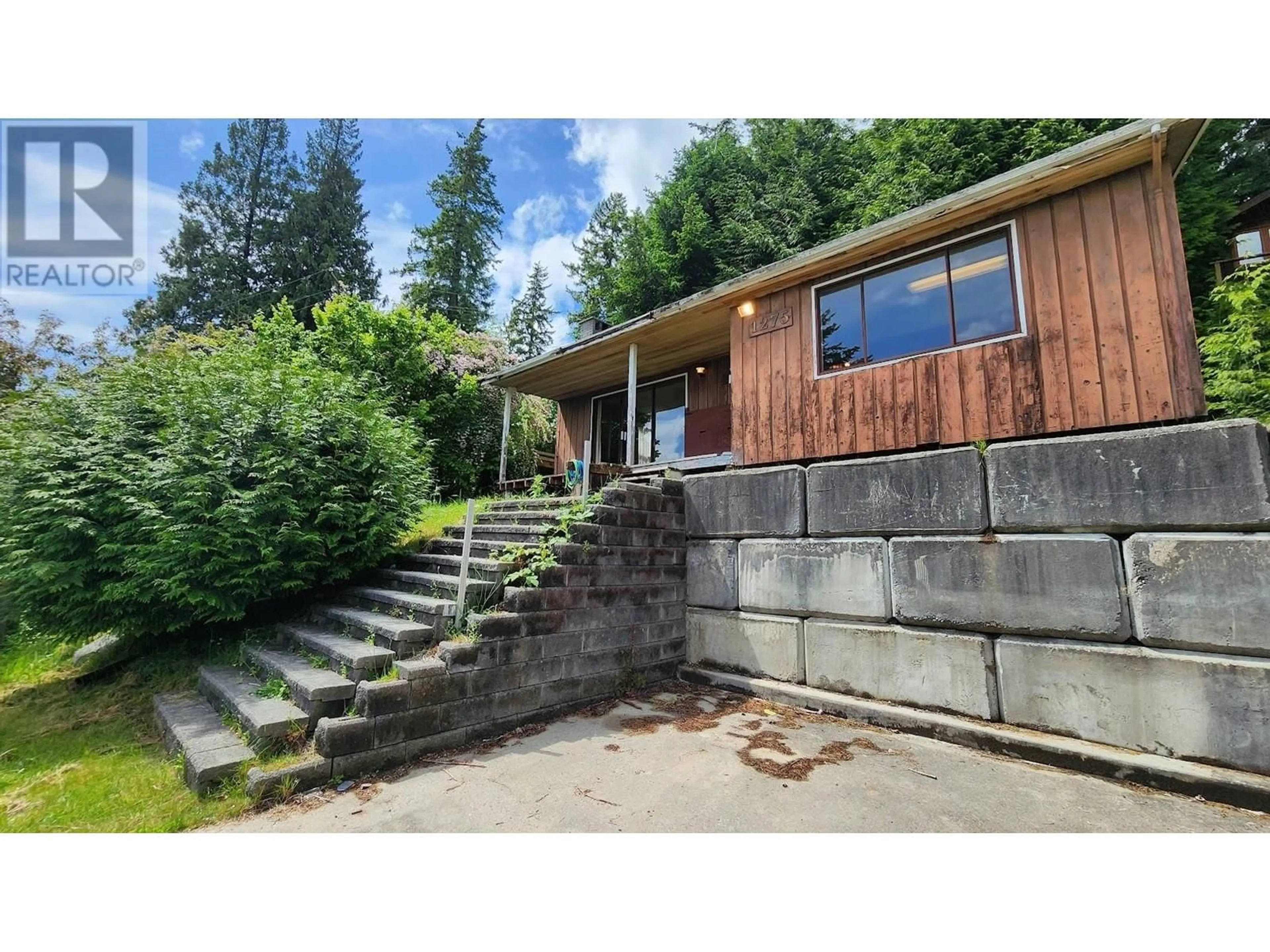 A pic from outside/outdoor area/front of a property/back of a property/a pic from drone, street for 1275 BURNS ROAD, Gibsons British Columbia V0N1V1