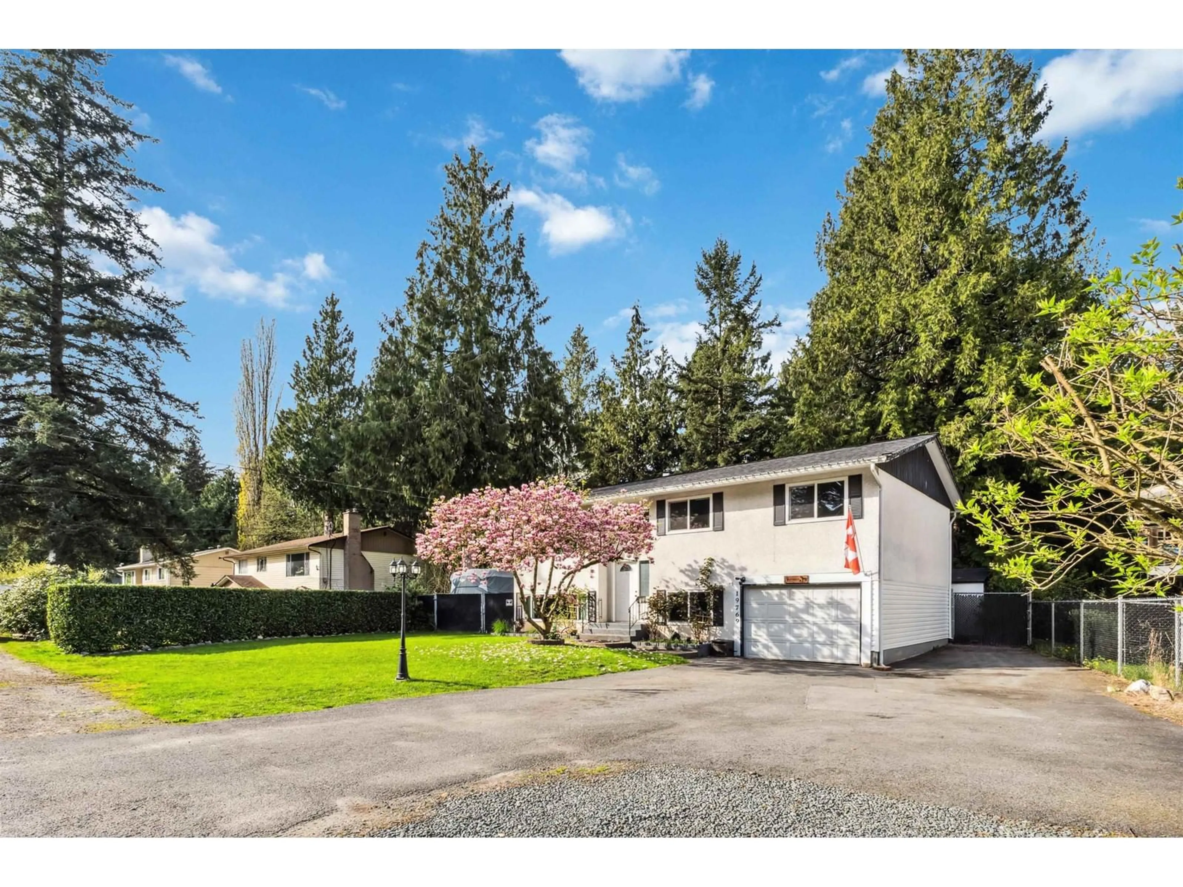A pic from outside/outdoor area/front of a property/back of a property/a pic from drone, street for 19769 38A, Langley British Columbia V3A4W7