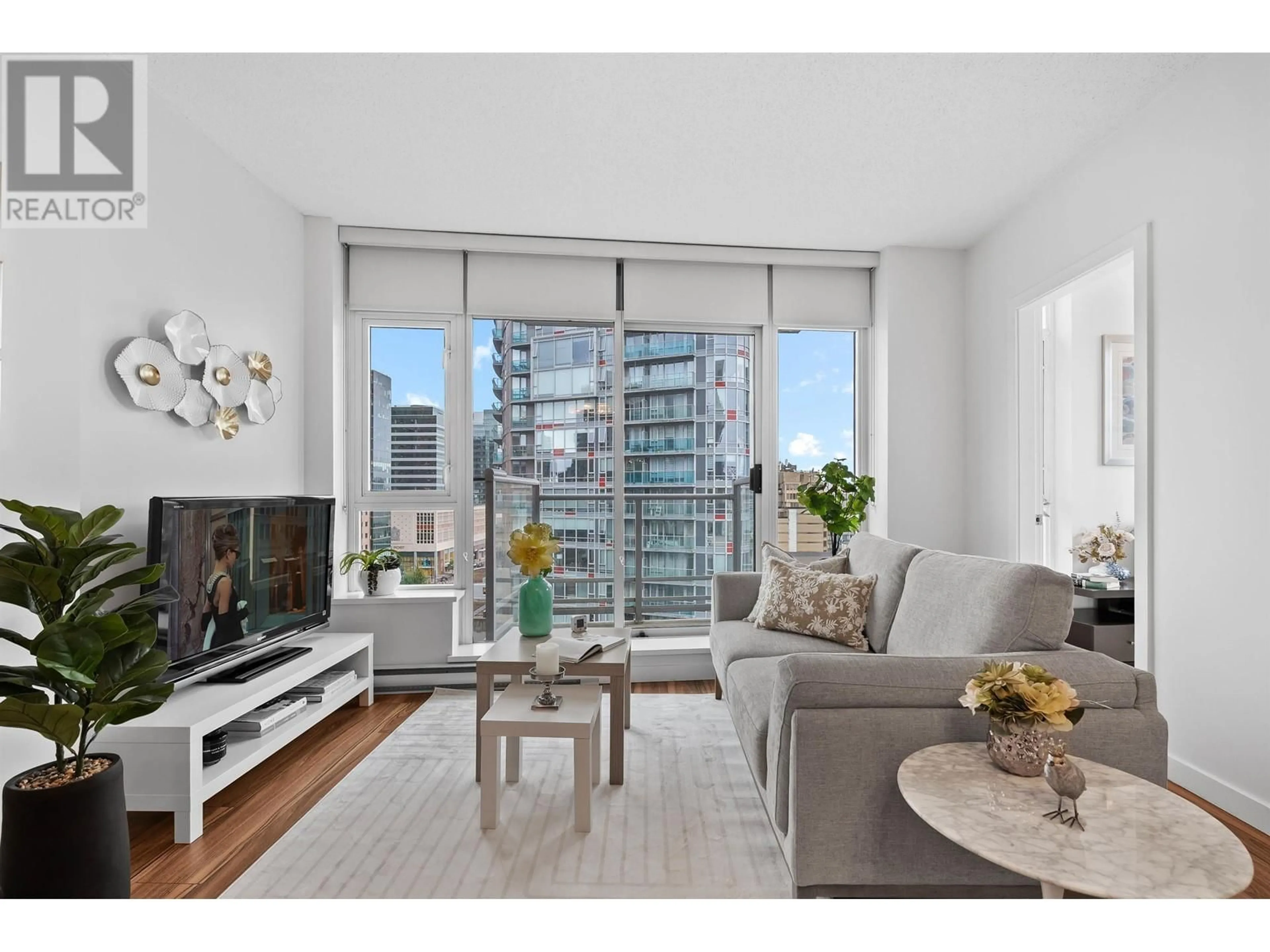 Living room with furniture, wood/laminate floor for 1504 - 821 CAMBIE STREET, Vancouver British Columbia V6B0E3