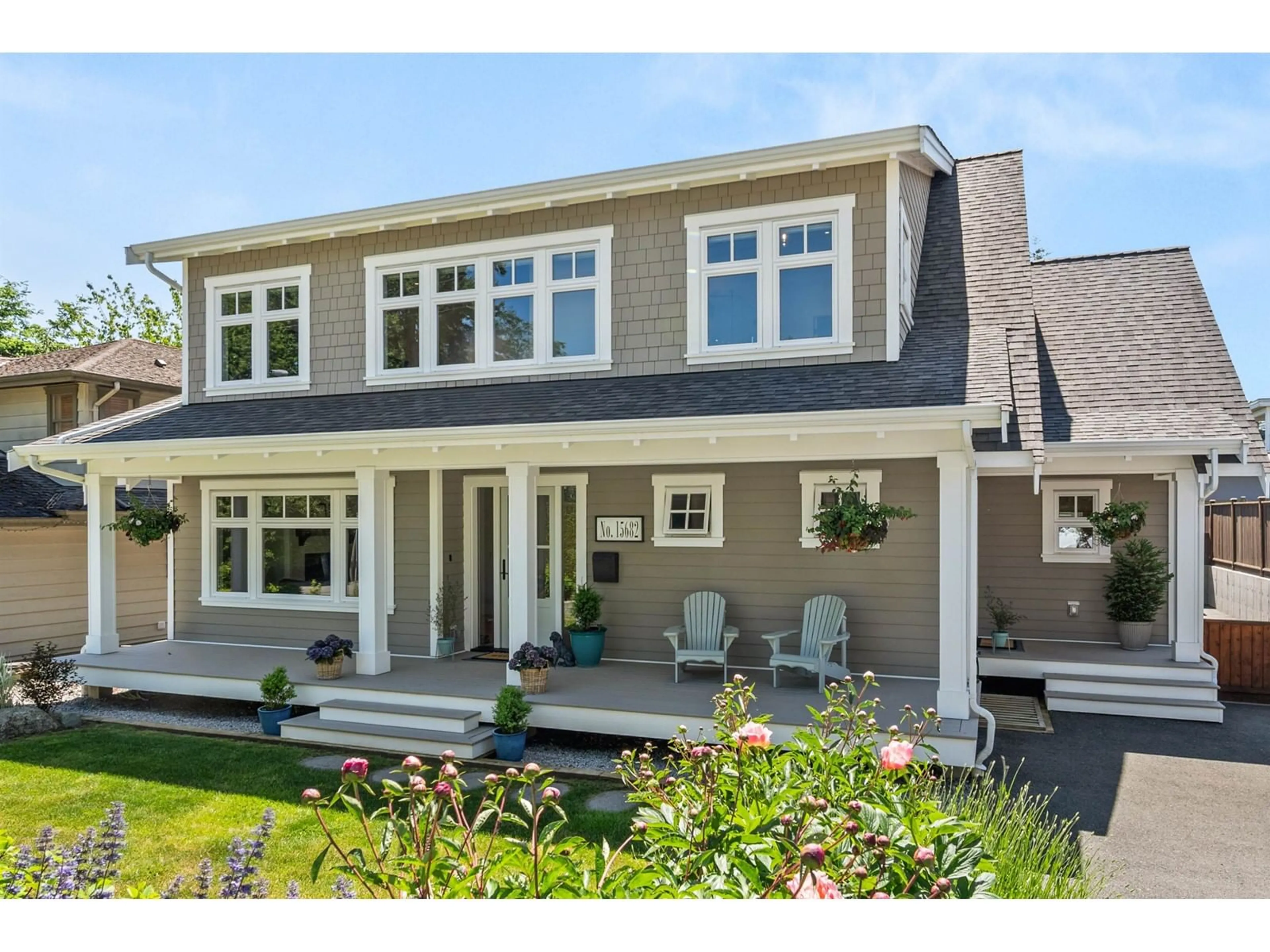 Home with vinyl exterior material, street for 15682 THRIFT, White Rock British Columbia V4B2M4