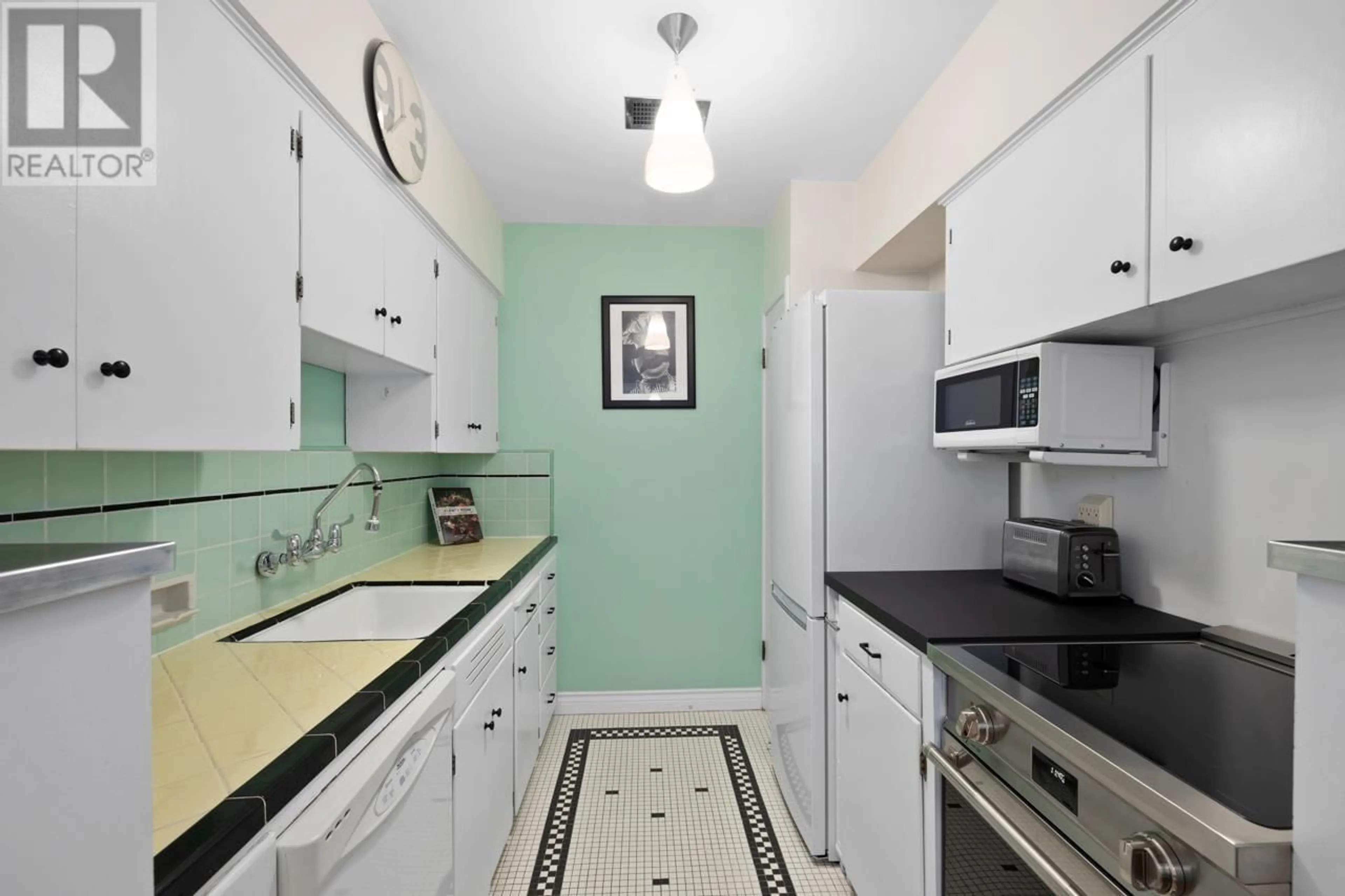 Standard kitchen, ceramic/tile floor for 204 - 1565 BURNABY STREET, Vancouver British Columbia V6G1X1