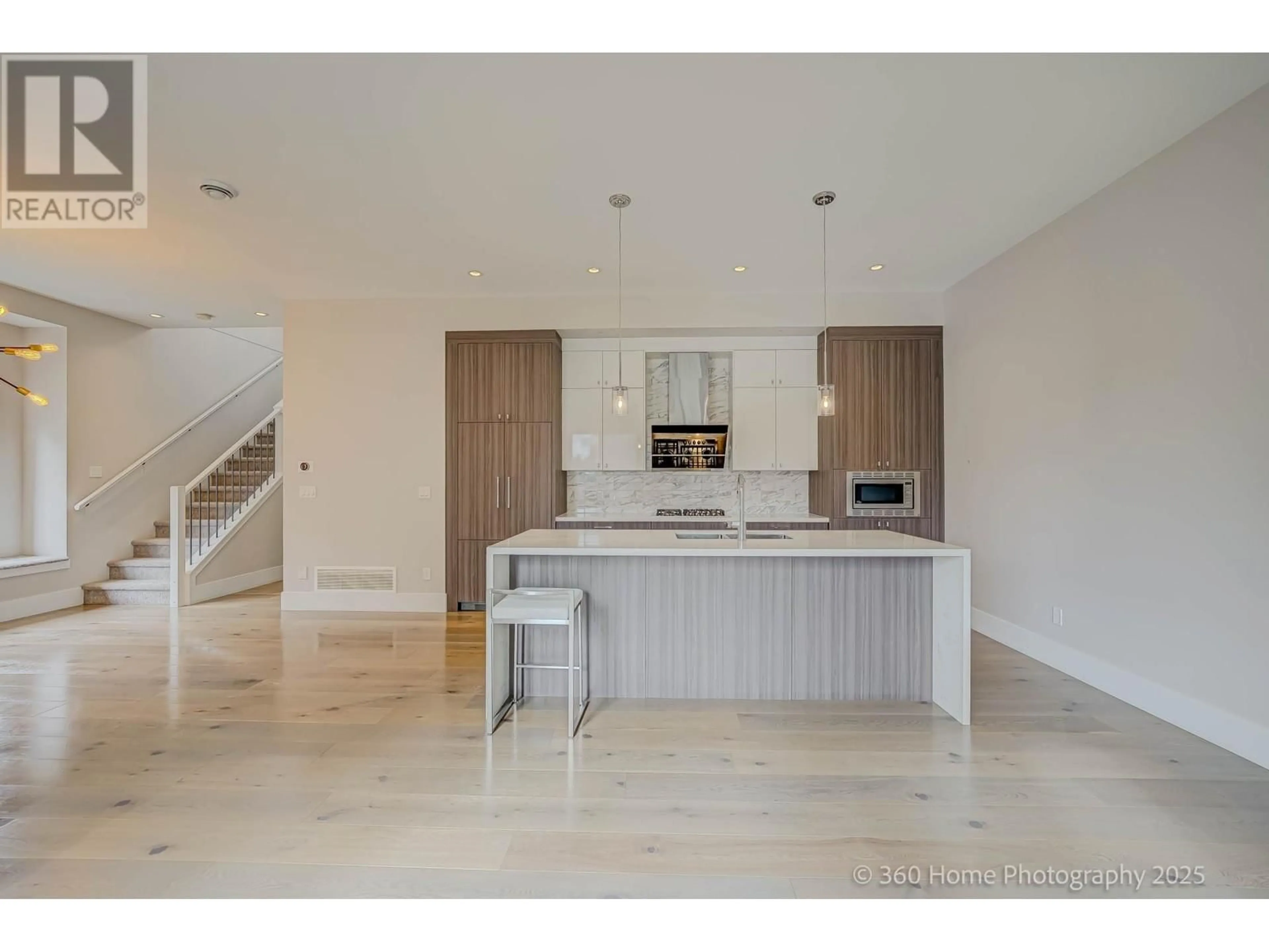 Open concept kitchen, wood/laminate floor for 9 - 5071 STEVESTON HIGHWAY, Richmond British Columbia V7E2K5