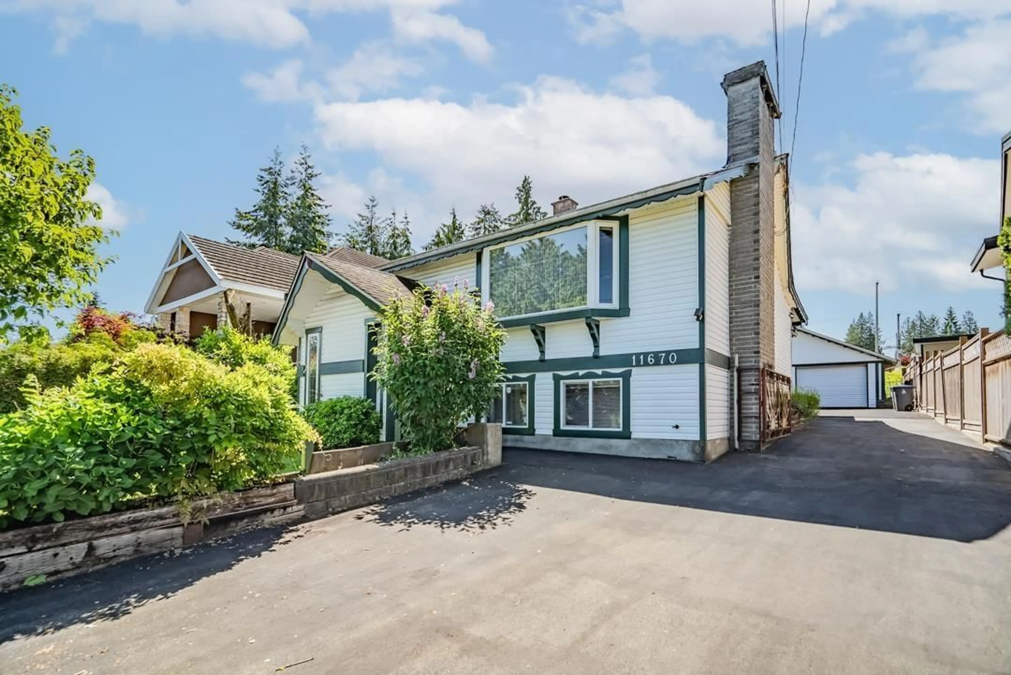 A pic from outside/outdoor area/front of a property/back of a property/a pic from drone, street for 11670 96A, Surrey British Columbia V3A2A1