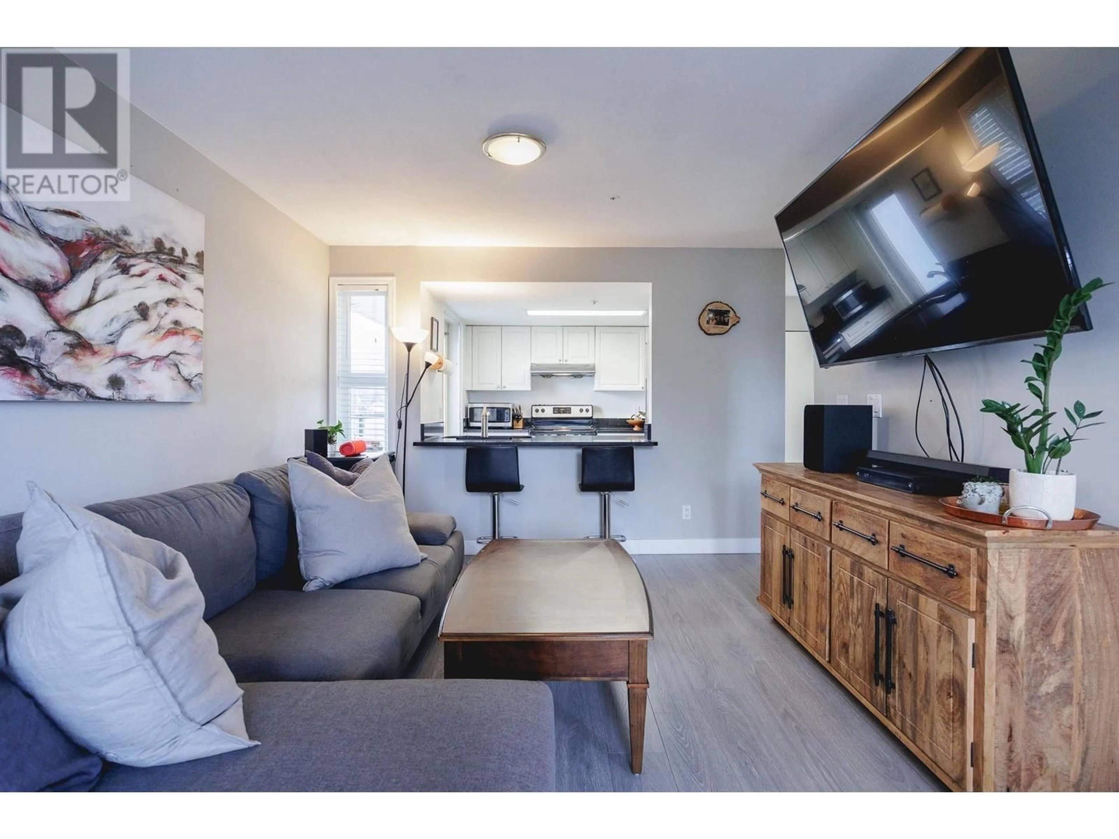 Living room with furniture, wood/laminate floor for 305 - 1519 GRANT AVENUE, Port Coquitlam British Columbia V3B7S8