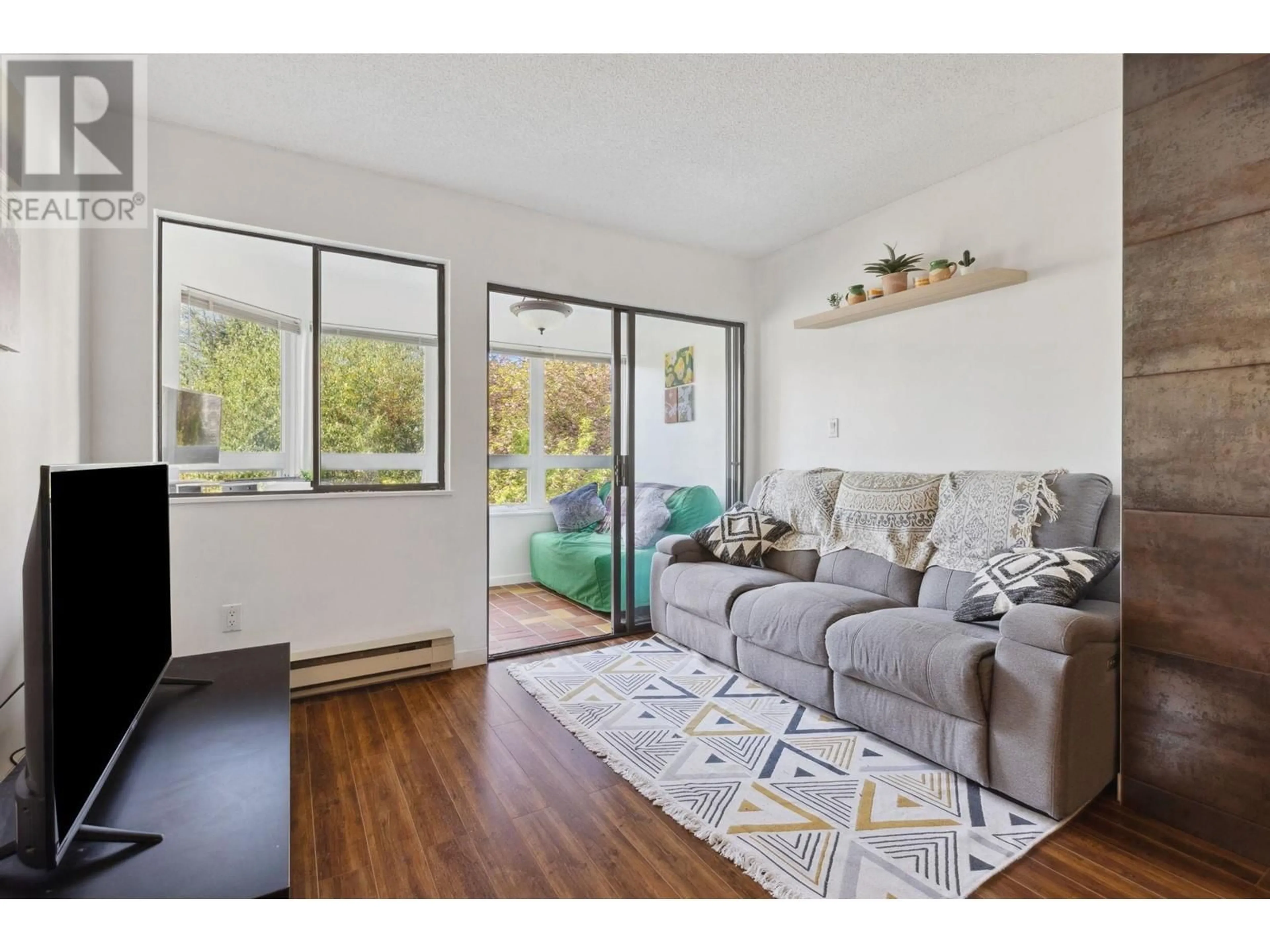 Living room with furniture, unknown for 204 - 1155 ROSS ROAD, North Vancouver British Columbia V7K1C6