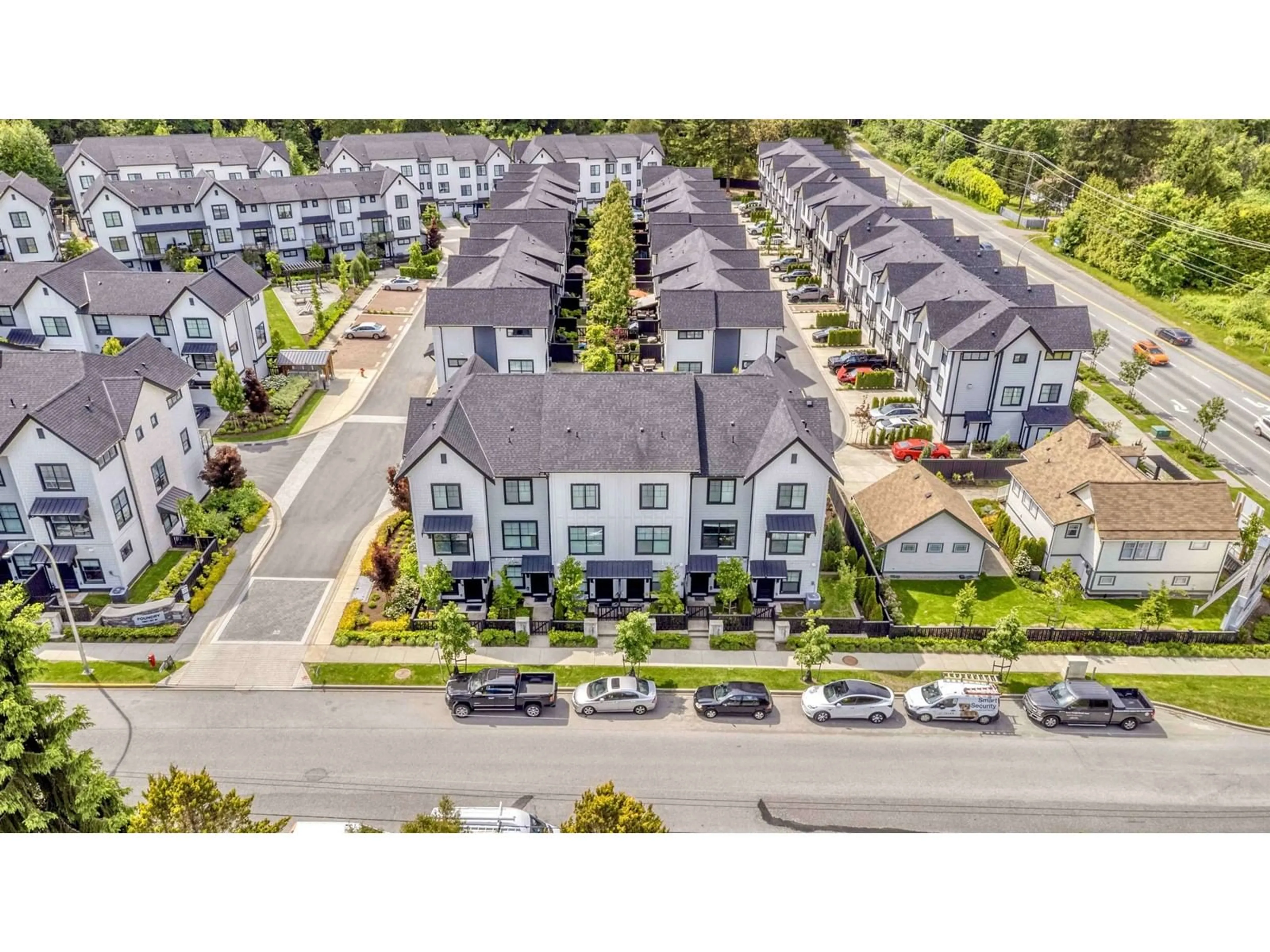 A pic from outside/outdoor area/front of a property/back of a property/a pic from drone, street for 5 - 7967 197, Langley British Columbia V2Y3P1