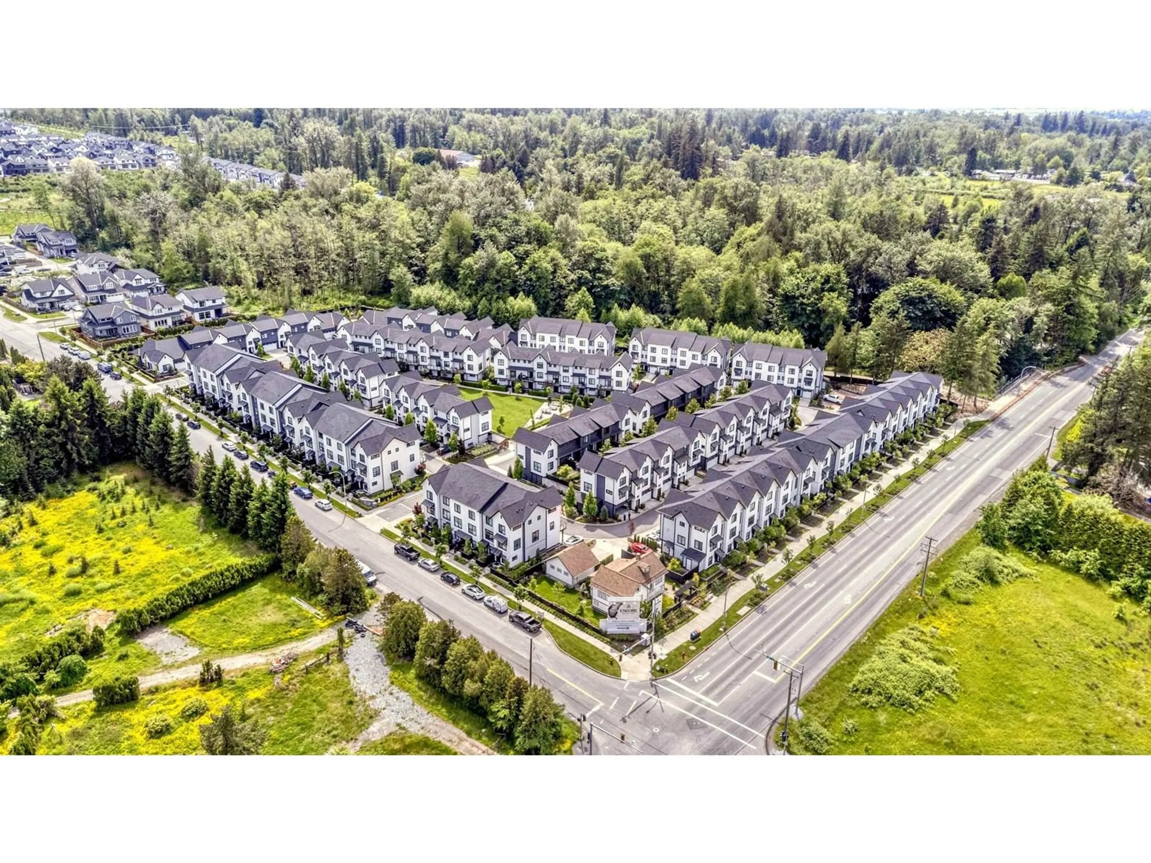 A pic from outside/outdoor area/front of a property/back of a property/a pic from drone, street for 5 - 7967 197, Langley British Columbia V2Y3P1