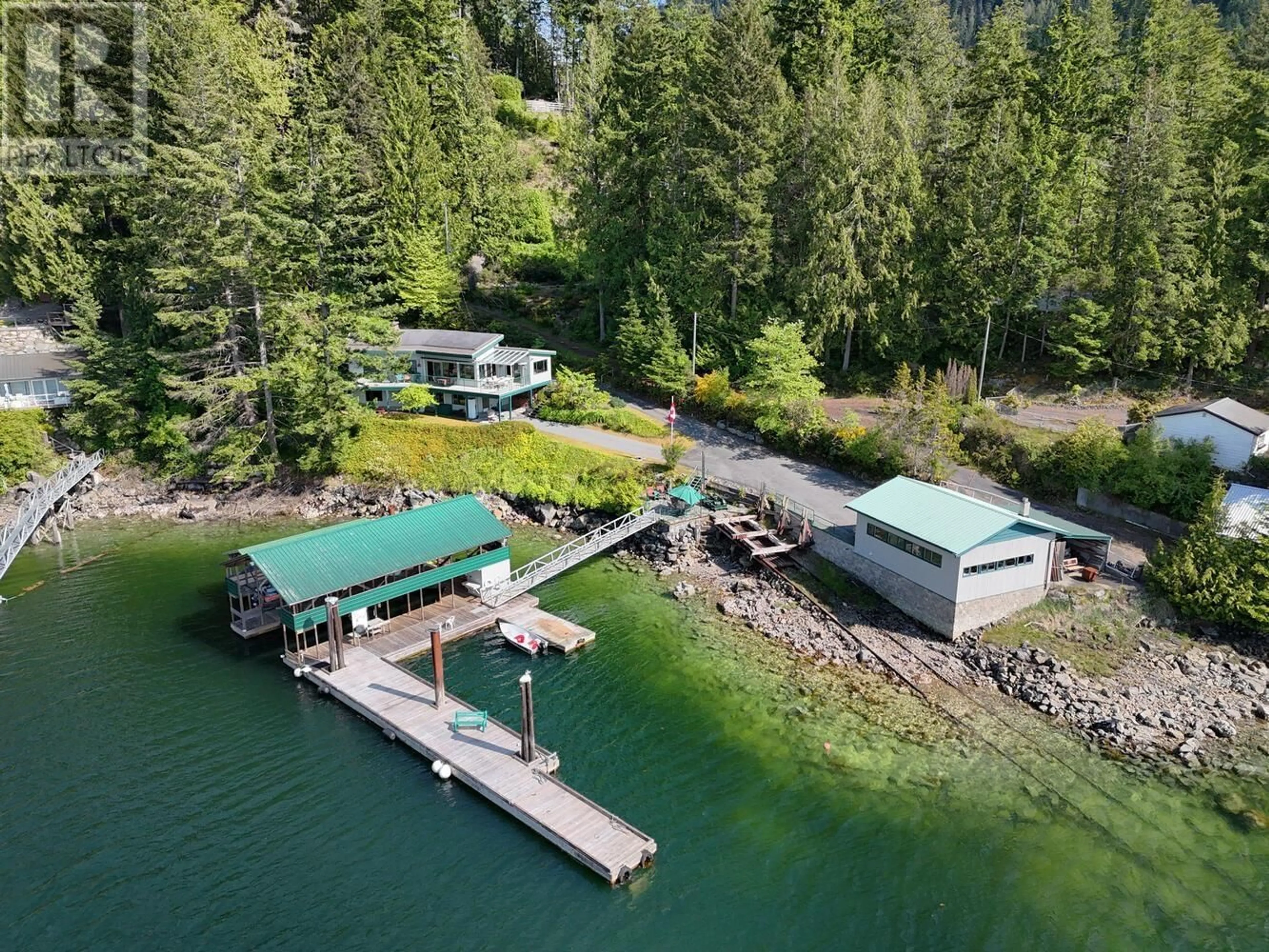 A pic from outside/outdoor area/front of a property/back of a property/a pic from drone, water/lake/river/ocean view for 13109 CLAYDON LANE, Garden Bay British Columbia V0N1S1