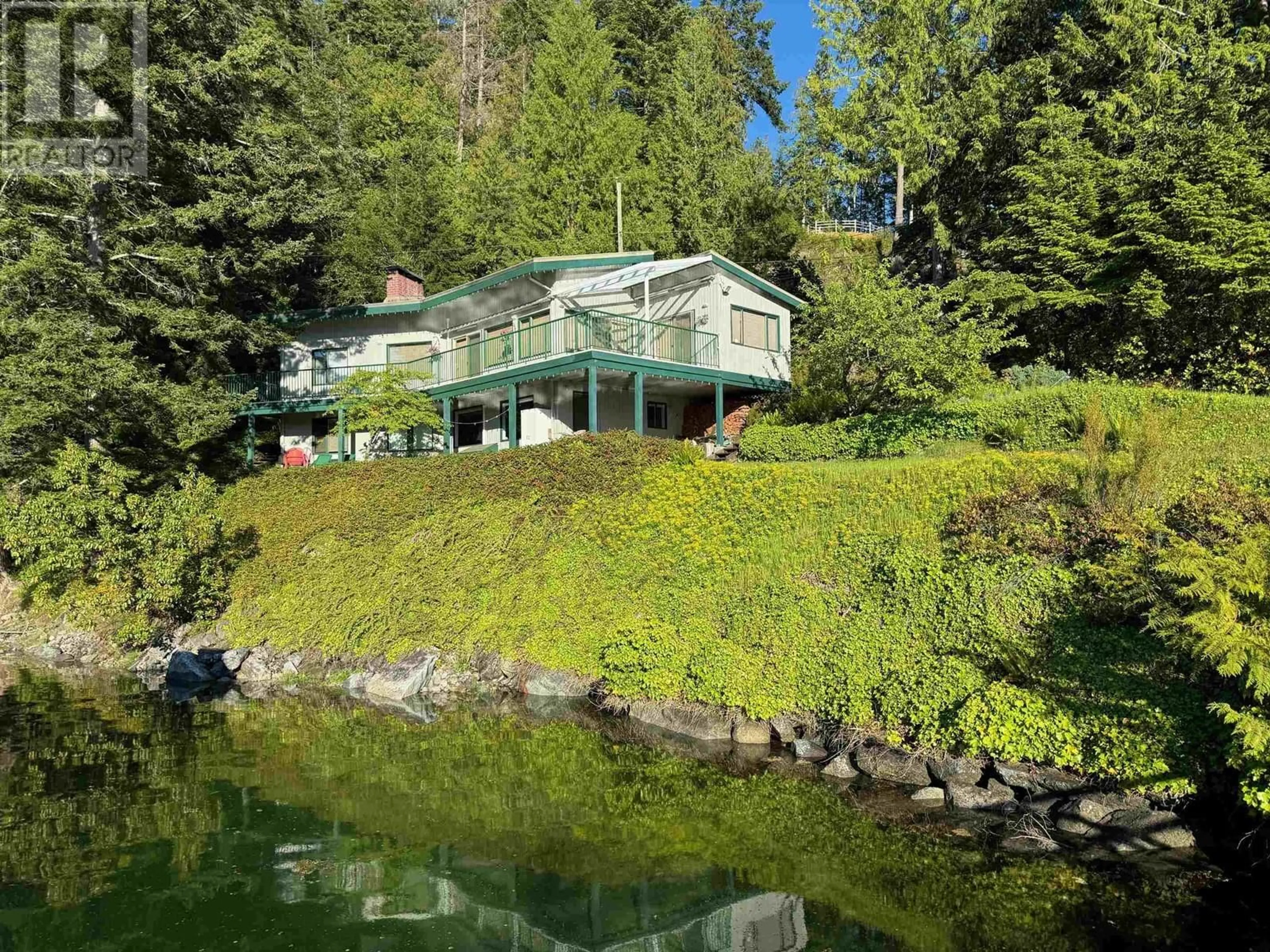 A pic from outside/outdoor area/front of a property/back of a property/a pic from drone, water/lake/river/ocean view for 13109 CLAYDON LANE, Garden Bay British Columbia V0N1S1